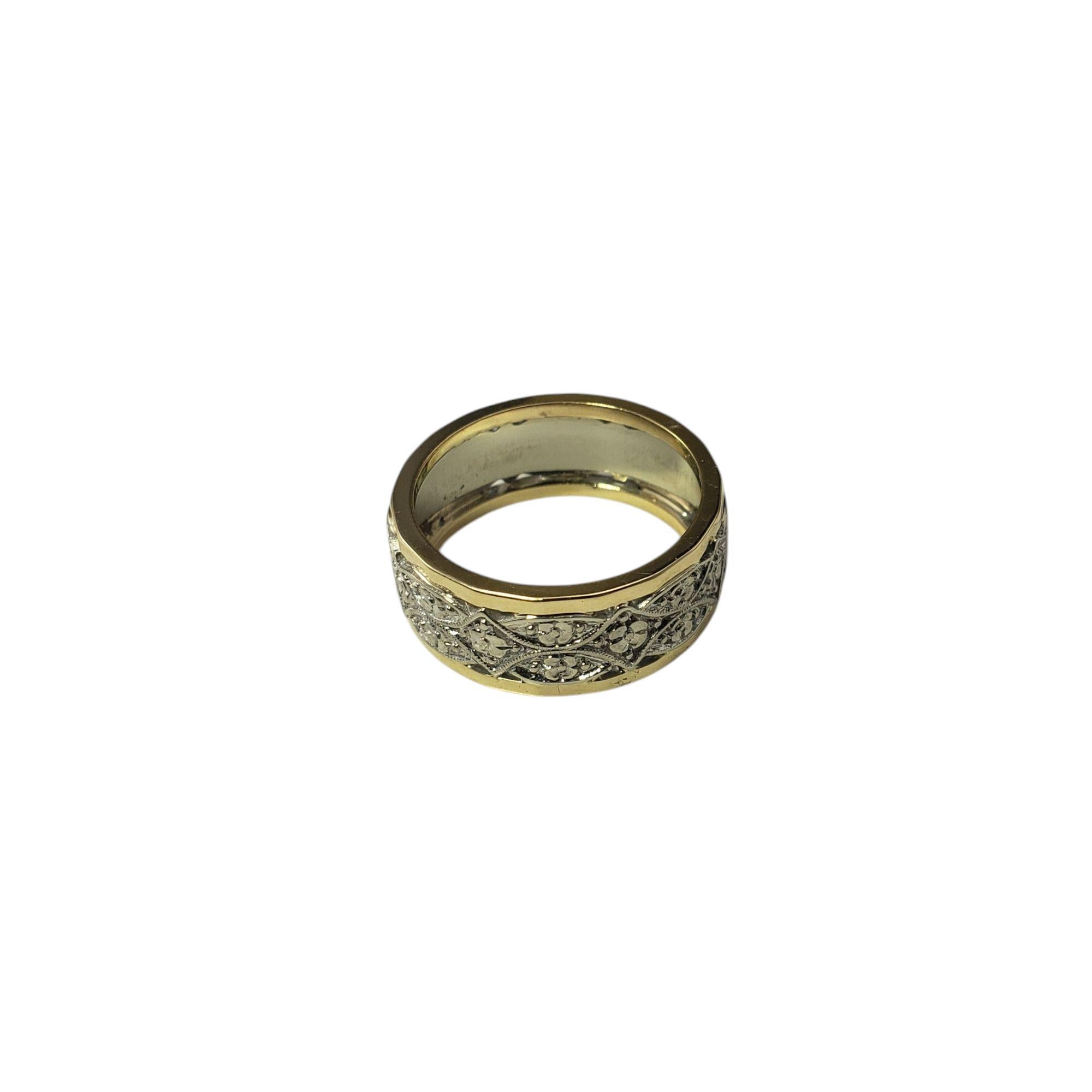 14K Two-Tone Gold Floral Wide Band Ring Size 6.75

This elegant band is crafted in beautifully detailed 14K white and yellow gold.

Width: 8 mm.

Ring Size: 6.75

Weight: 6.5 dwt./ 10.1 gr.

Stamped: 14K

Very good condition, professionally