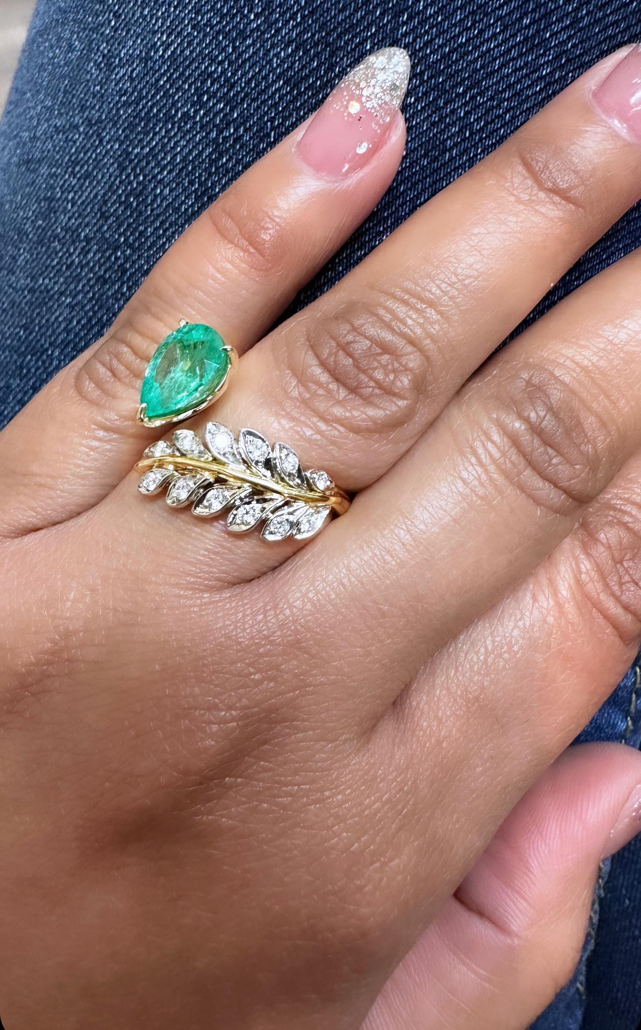 For Sale:  14K Two Tone Gold Pear Shape Emerald Center and Laurel Diamond Ring 4