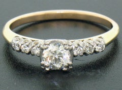 Anillo de compromiso solitario en oro bicolor de 14 quilates con diamantes talla europea