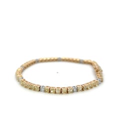 14K Two Tone Gold Tennis Bracelet with 5.4 Carat Round Fancy Yellow Diamonds