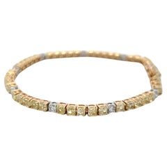 14K Two Tone Gold Tennis Bracelet with 5.4 Carat Round Fancy Yellow Diamonds