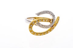 14k Two Tone Contemporary Diamond Horseshoe Swirl Ring, App. 0.29 TCW