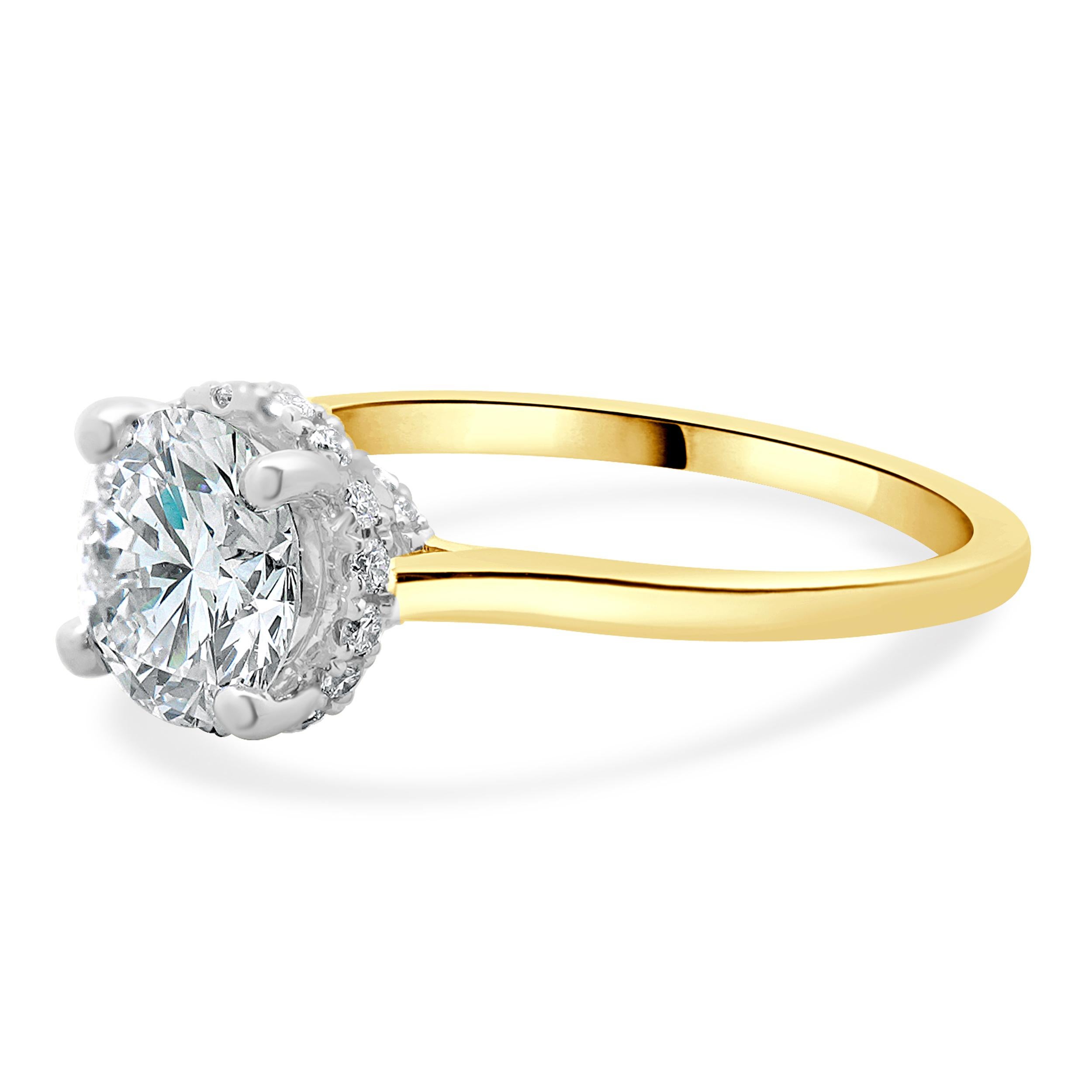 Designer: custom
Material: 14K Two Tone
Diamond: 1 round brilliant cut = 1.68ct
Color: D
Clarity: SI1
Diamond:  round brilliant = 0.25cttw
Color: G
Clarity: SI1
Ring Size: 6.5 (complimentary sizing available)
Weight: 2.83 grams
