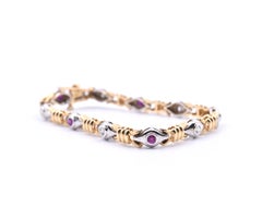 14 Karat Two-Tone Ruby and Diamond Tennis Bracelet