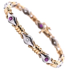 14 Karat Two-Tone Ruby and Diamond Tennis Bracelet