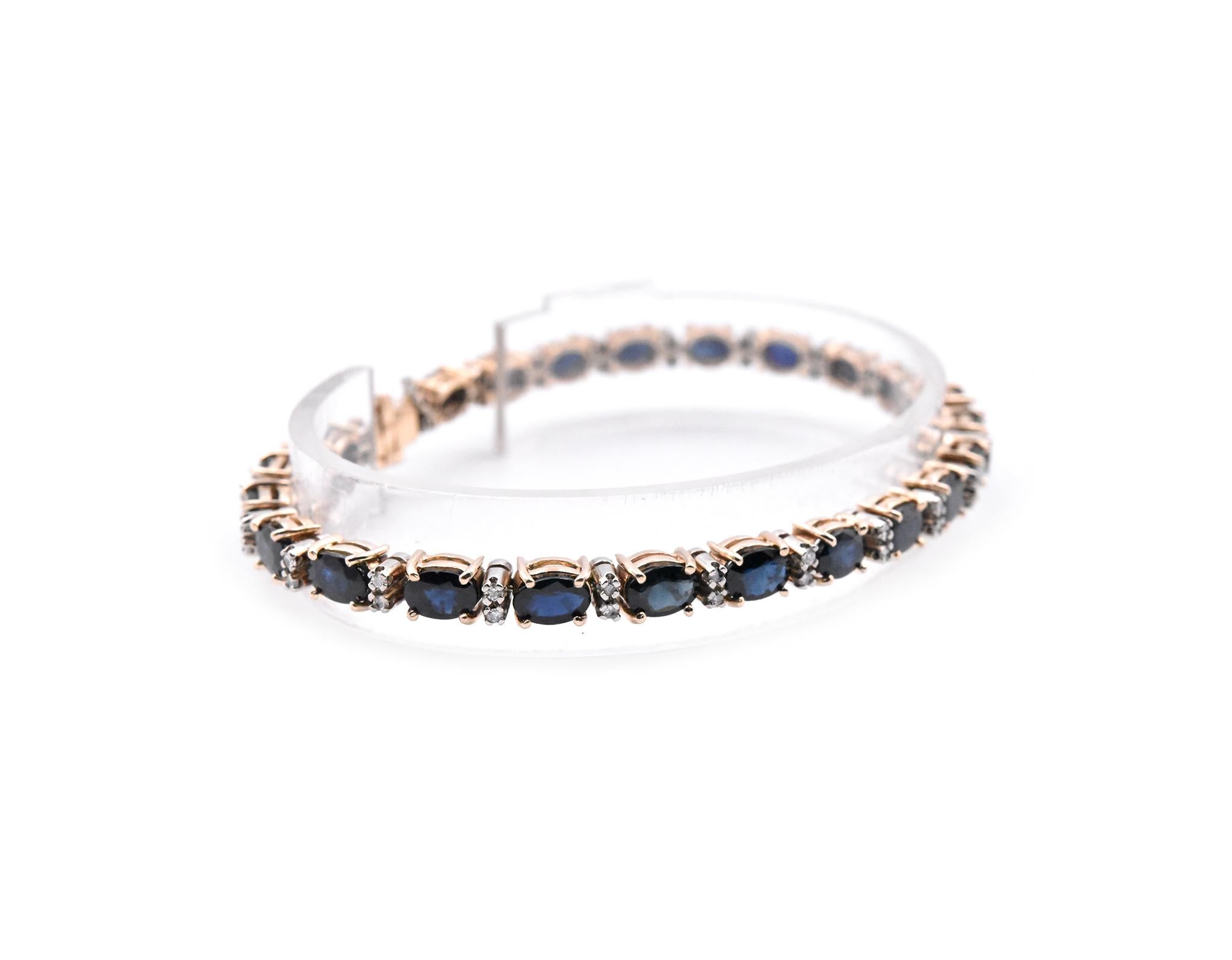 Designer: custom 
Material: 14k yellow and white gold
Sapphires: 24 oval faceted sapphires = 10.32cttw
Diamonds: 48 round brilliant cuts = 0.75cttw
Color: H
Clarity: SI1
Dimensions: bracelet will fit up to a 7.5-inch wrist and 5.10mm in