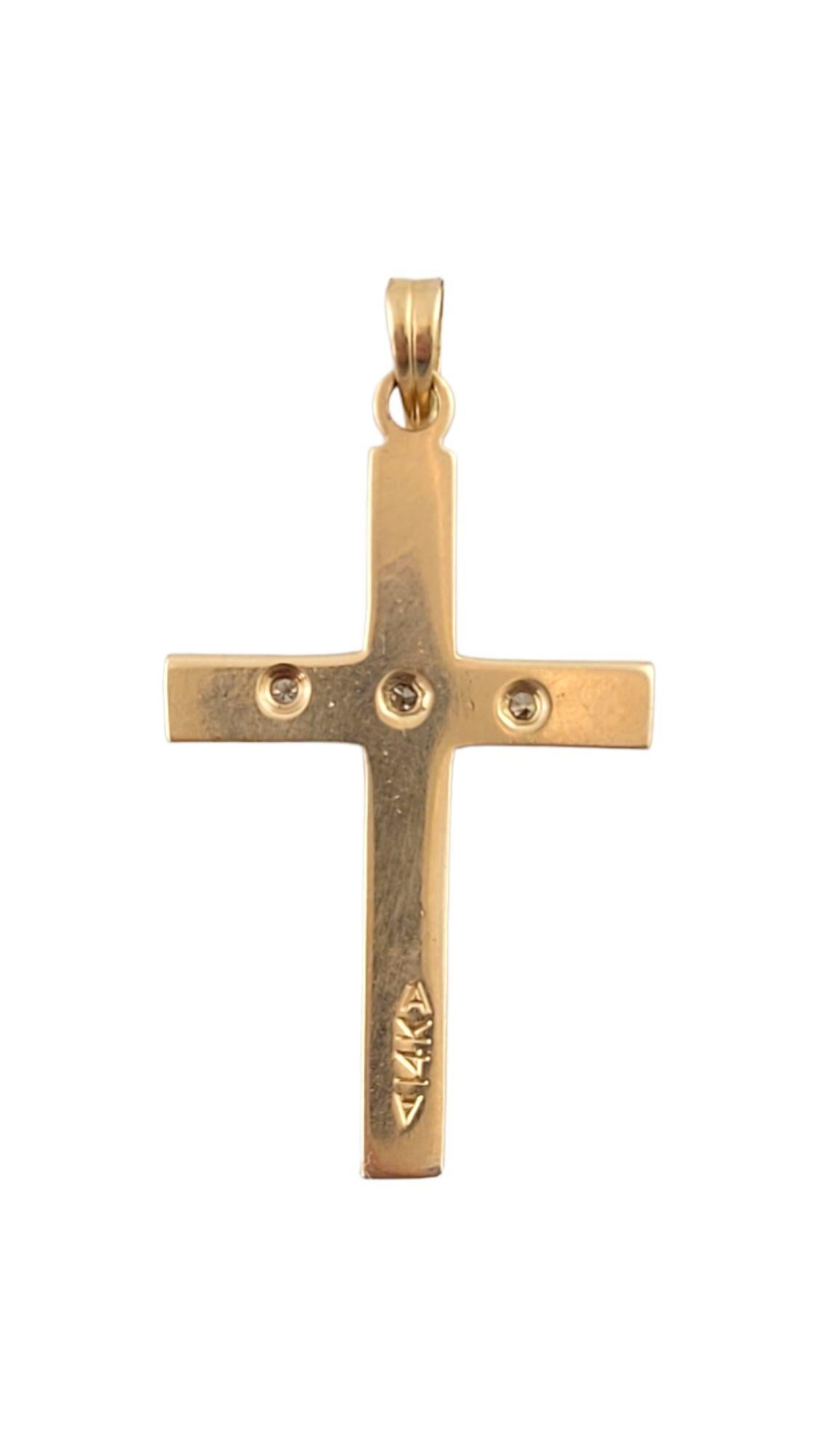 Gorgeous two tone yellow and white gold cross pendant decorated with 3 beautiful single cut diamonds!

Approximate total diamond weight: 0.02 cts

Diamond clarity: VS2

Diamond color: G

Size: 28mm X 17mm X 2mm

Length w/ bail: 32mm

Weight: 1.56 g/