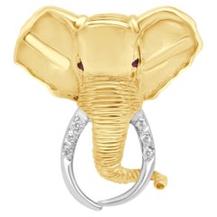 Anstecknadel in Form eines Elefanten aus 14-karätigem Zweifarb-Gold (Gelb- und Weißgold) mit rundem Rubin und rundem Diamanten