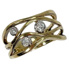 Bague bicolore 14K avec diamant .13 CTW