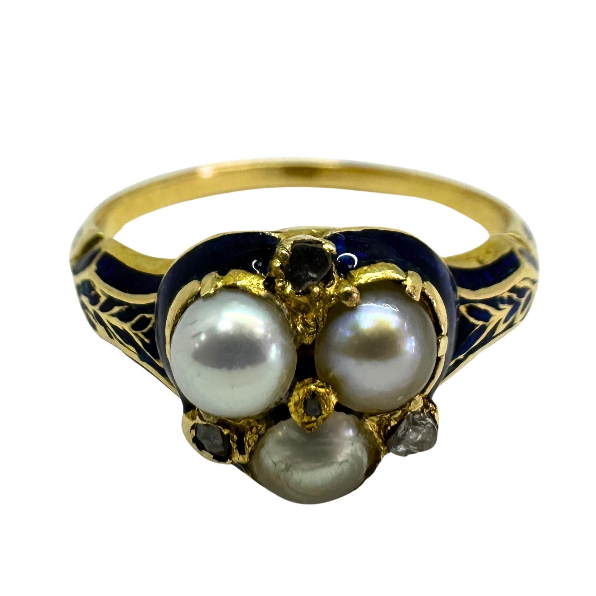 Add a touch of vintage elegance to your collection with this stunning 14k Victorian Diamond, Pearl and Blue Enamel Trefoil Ring. Crafted in 14k yellow gold, this ring features a trefoil design adorned with shimmering diamonds and a lustrous pearl,