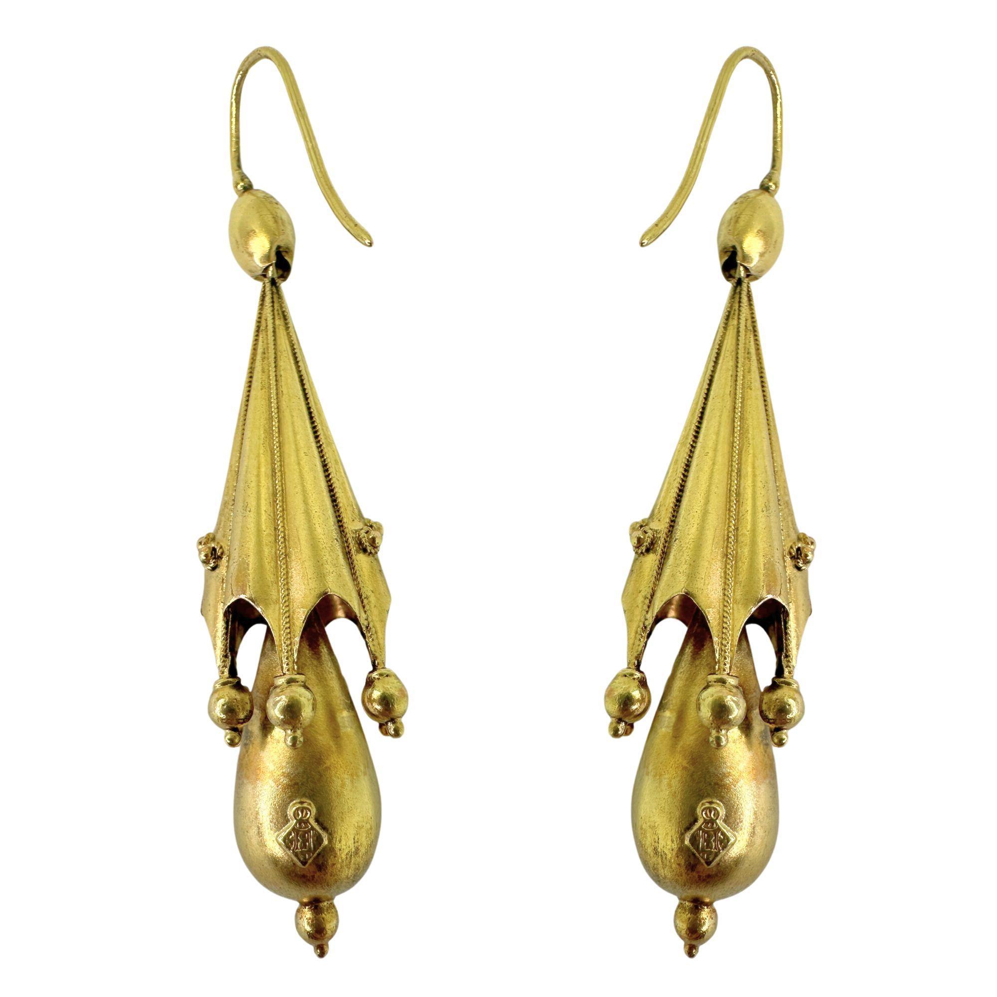 Add a touch of vintage elegance with these stunning 14k Victorian Drop Earrings. Crafted in 14k yellow gold and featuring a 2.25 inch length, these earrings have a delicate and feminine look. In good condition with minor wear, they make a perfect
