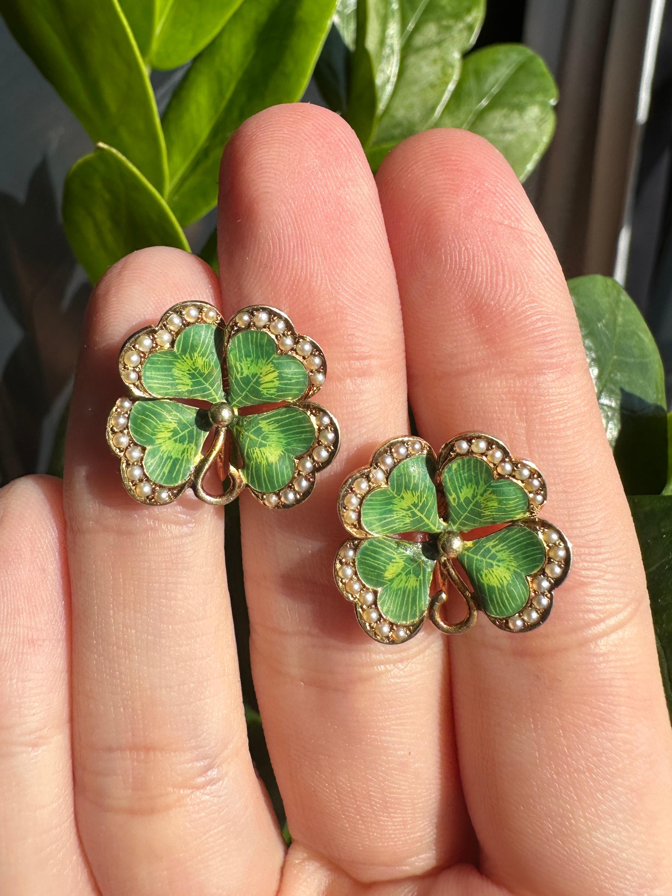 Bring a touch of Victorian charm to your wardrobe with these stunning 14k Victorian Enamel and Seed Pearl 4 Leaf Clover Ear Clips. Made of 14k yellow gold, these ear clips feature delicate enamel details and sparkling seed pearls. In good condition