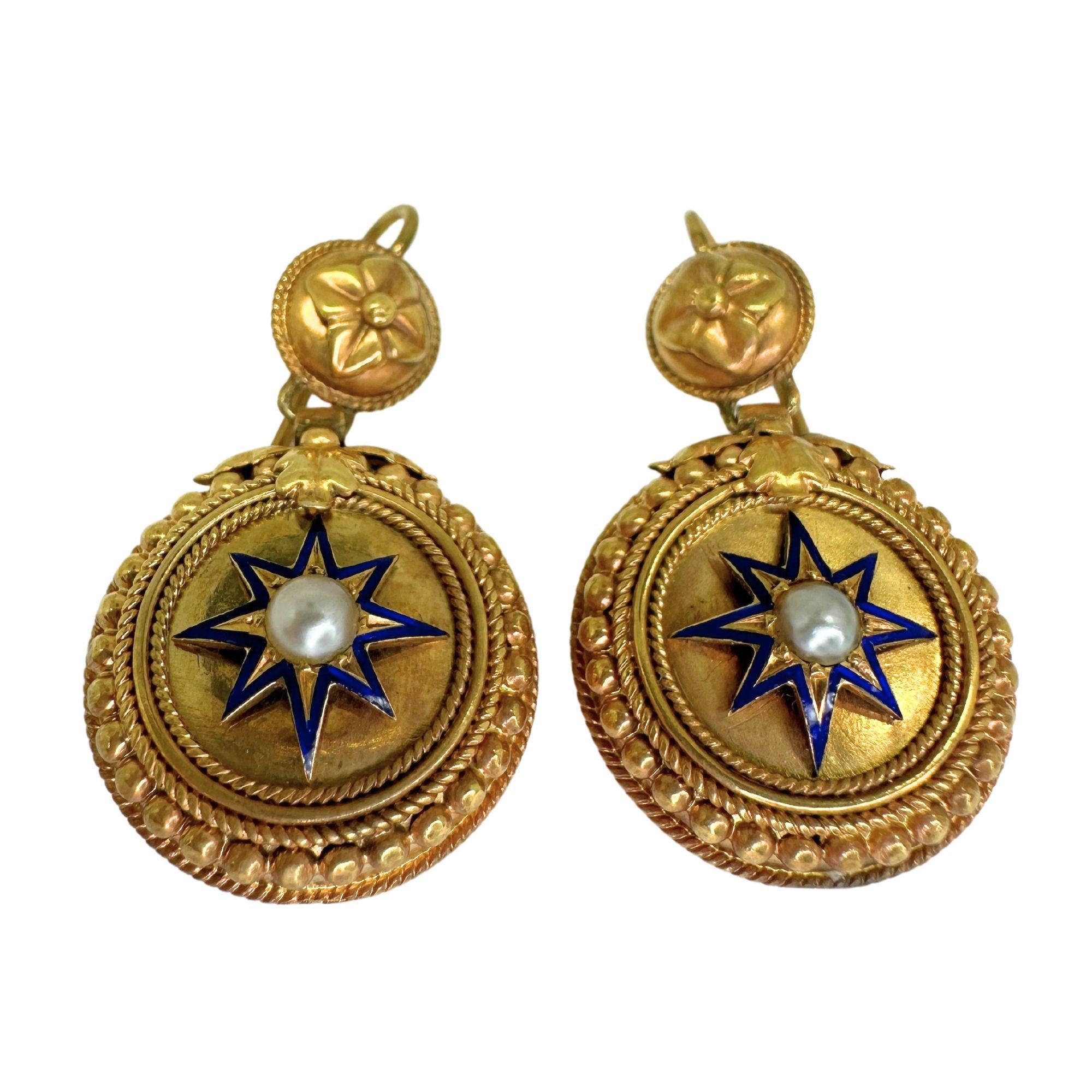 Elevate your look with these stunning 14k Victorian Pearl and Blue Enamel Drop Earrings. Made of 14k yellow gold and featuring a delicate Victorian design, these earrings are in good condition with minor surface wear. The 1.25 inch length and 8.1