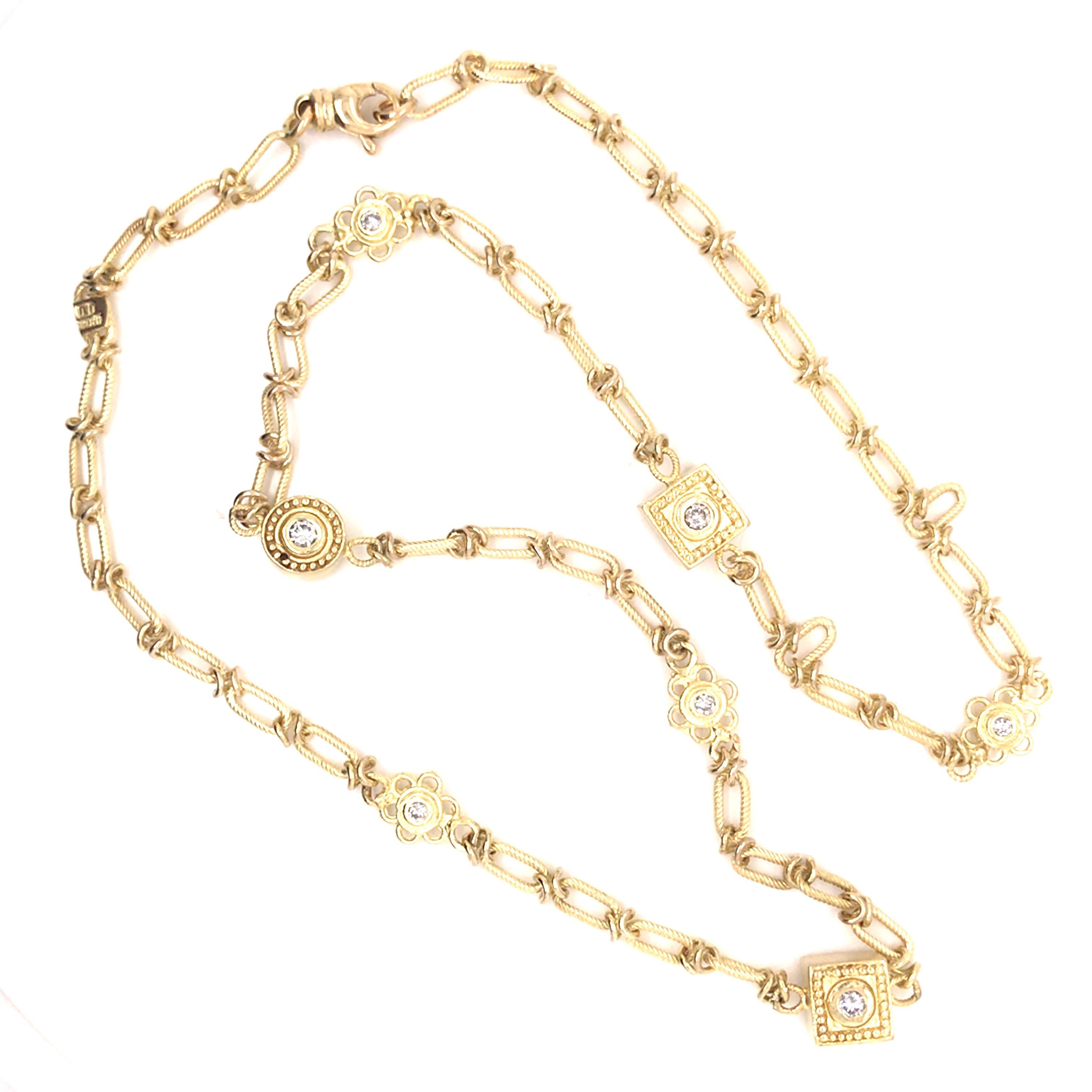 Vintage Diamond Station Chain Necklace in 14K Yellow Gold.  (14) Round Brilliant Cut Diamonds weighing 1.25 carat total weight, G-I in color and VS-I1 in clarity are expertly set.  The Necklace measures 18 inch in length. Lobster Claw clasp.  22.23
