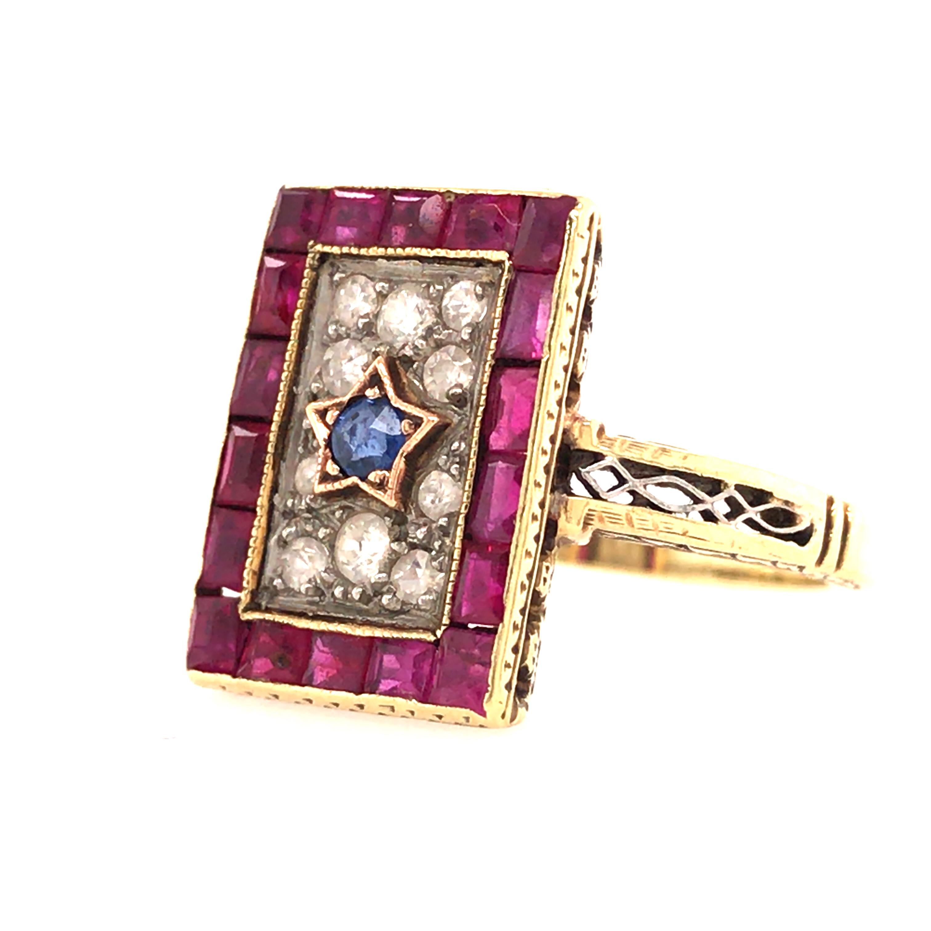 14K Vintage Red, White and Blue - Ruby, Diamond and Sapphire Ring in Yellow Gold.  Expertly set with (18) Rubies weighing .72 carats, (10) Round Brilliant Cut Diamonds weighing .13 carats, G-H in color, VS clarity and (1) Sapphire .10 carats in the