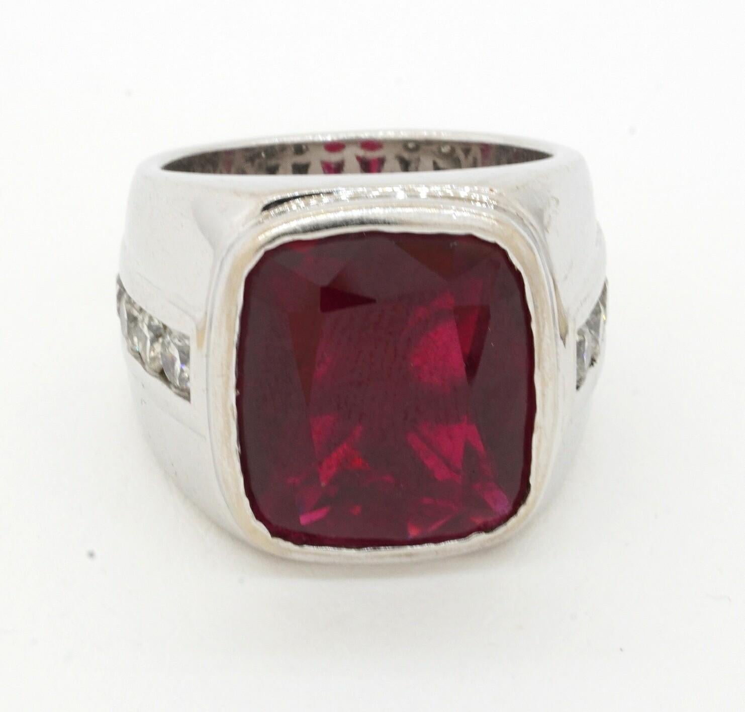 Heavy 14K WG 13.20CT VS diamond & synthetic ruby men's ring size 7.75. This intriguing piece of jewelry is crafted in gorgeous 14K white gold and features a synthetic approx. 12.0CT (14 x 12mm) ruby center, as well as, 8 diamonds (Excellent VS2 -