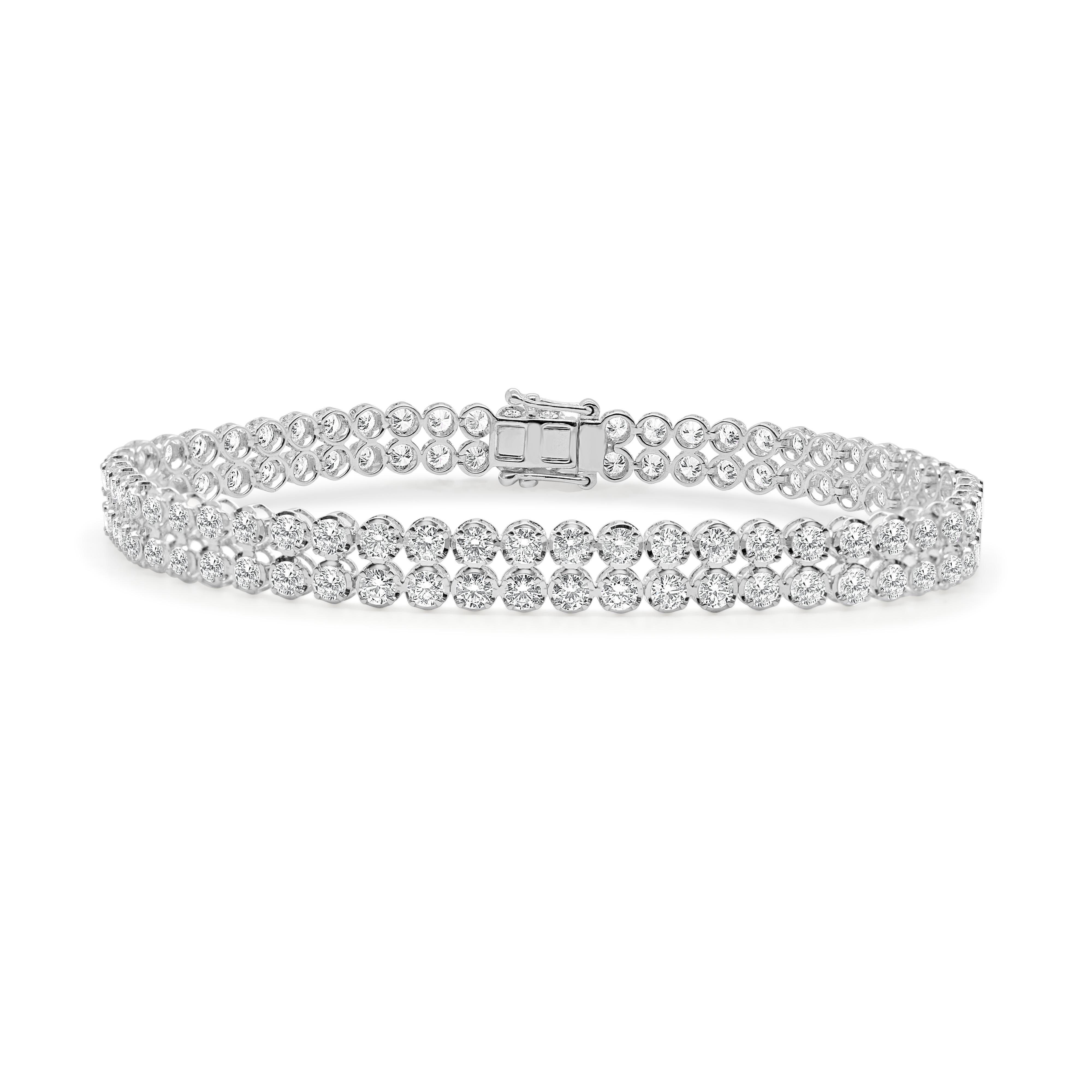 GORGEOUS  Bracelet de tennis à deux rangs de diamants naturels comprenant 112 diamants ronds. A porter au quotidien ou lors d'événements spéciaux, ou à offrir à un être cher. Il s'agira d'une pièce maîtresse de votre collection.

Or blanc 14K
Poids
