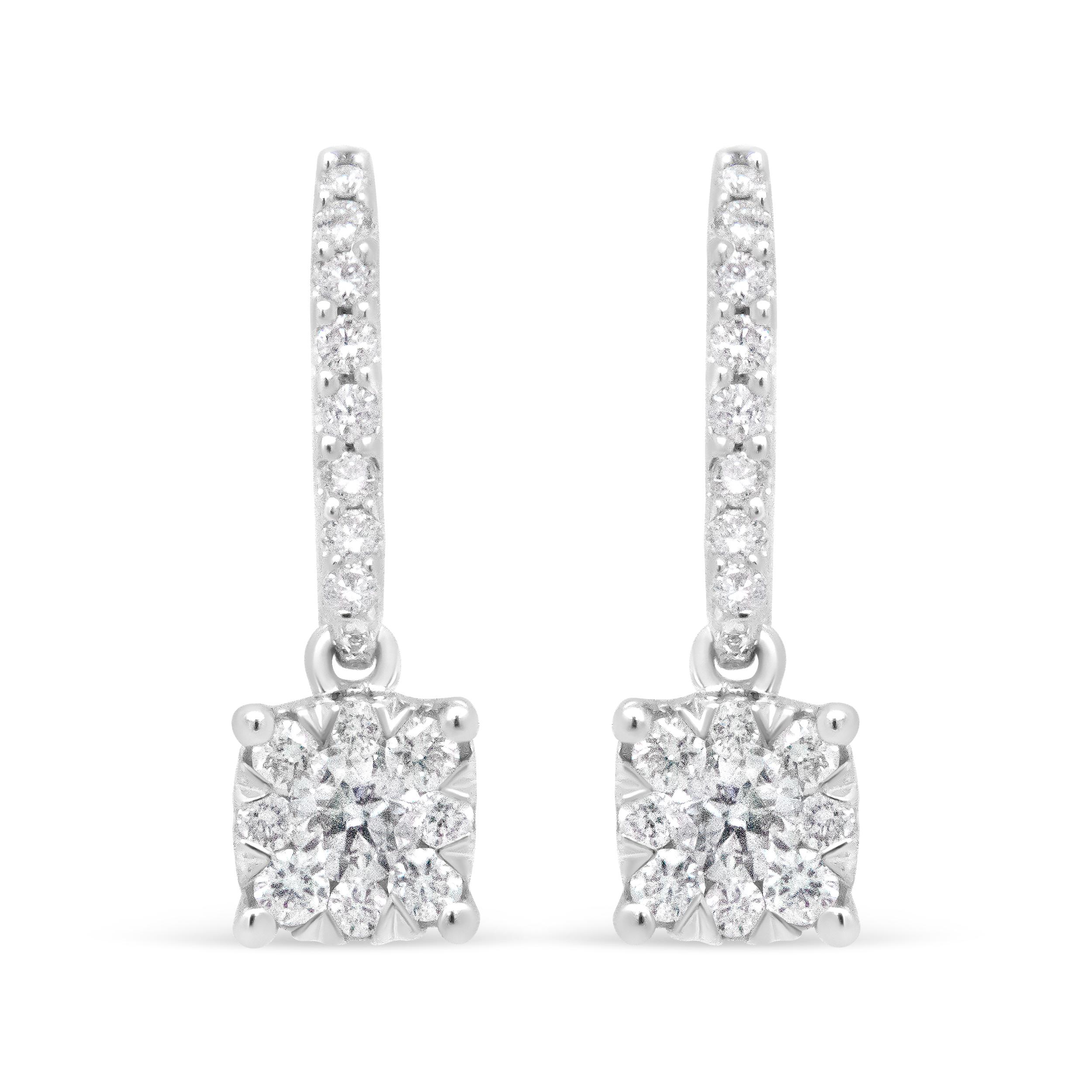 Sparkle is the name of the game for this pair of diamond dangle hook earring. A cascade of round, prong-set diamonds spill downward toward a central white diamond cradled in a pave setting and surrounded by a halo of round, prong-set diamonds. The