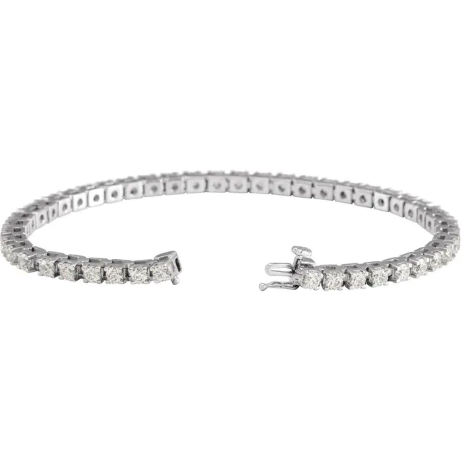 Specifications
Weight:	11.03 DWT (17.15 grams)
Solid/Hollow:	Solid
Bracelet/Anklet Size:	7 1/4 In
Prong Count:	4-prong
Bracelet Closure Type:	Hidden Clasp
Bracelet Type:	Line
Selling Unit of Measure:	EA
Gender:	Ladies
Plating