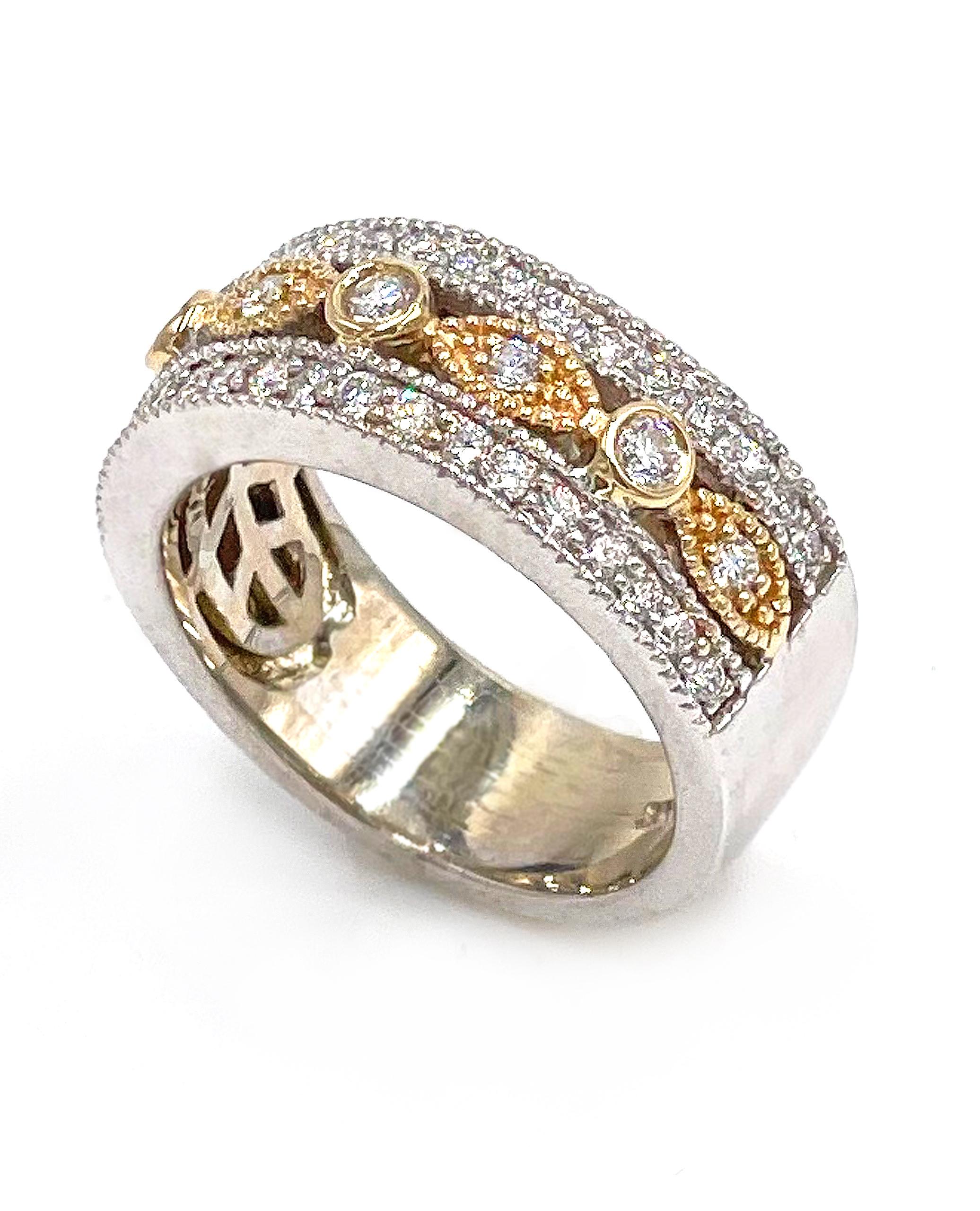 14K white and rose gold antique inspired ring with miligrain detailing.  The ring is furnished with 43 round brilliant-cut diamonds 0.60 carats total weight.

* Diamonds are G/H color, SI1 clarity.
* Finger size 5.75
* Approximately 8mm wide on top