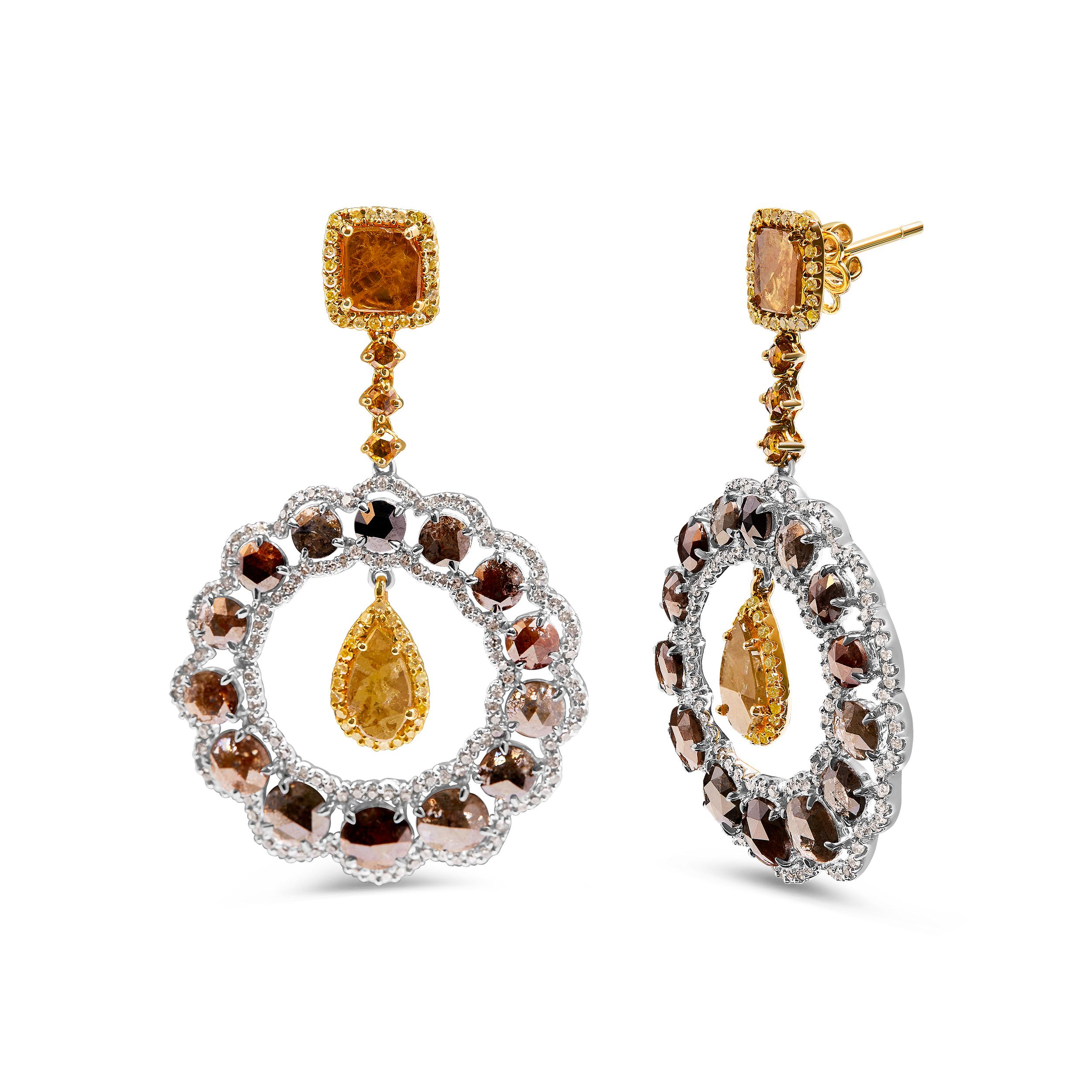 Introducing a mesmerizing masterpiece that effortlessly combines elegance and extravagance. These 14K White and Yellow Gold Dangle Hoop and Bale Earrings are a dazzling embodiment of opulence. Crafted with meticulous care, these earrings boast a