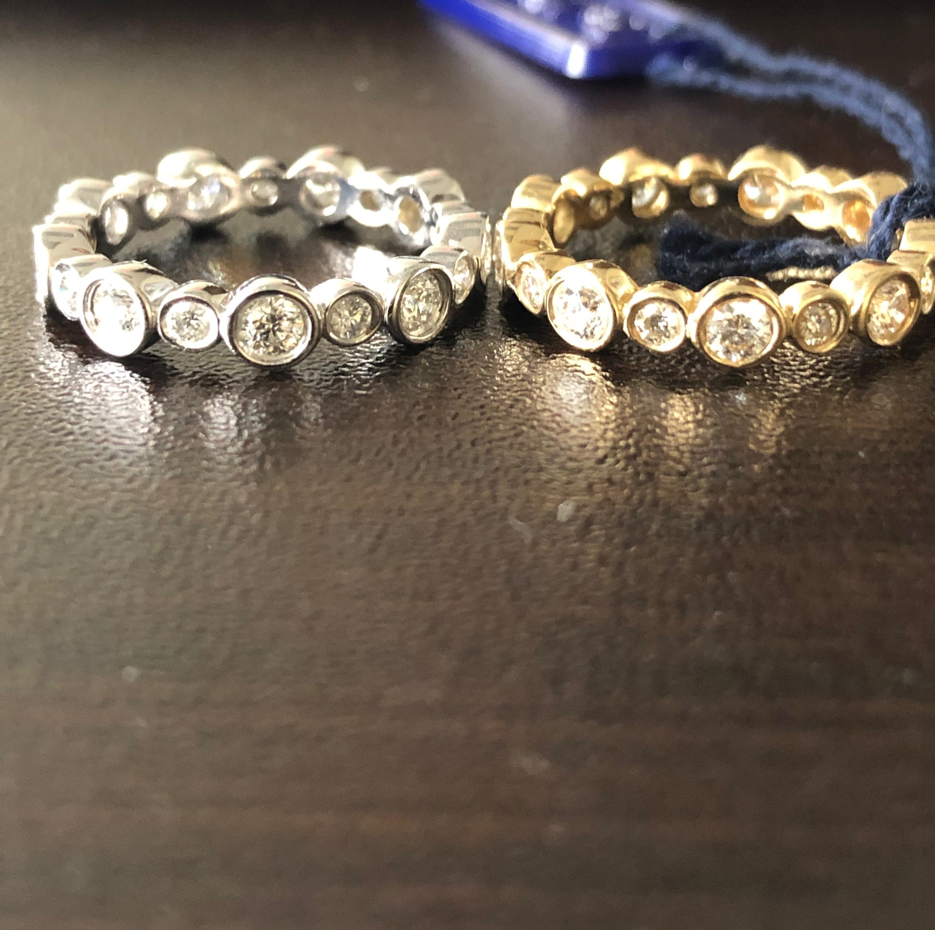 Women's 14 Karat White and Yellow Gold Diamond Bezel Eternity Rings For Sale