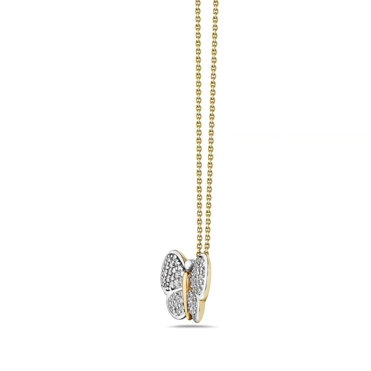 This necklace features 0.55 carats of diamonds set in 14K yellow and white gold. Made in USA

Viewings available in our NYC showroom by appointment.
