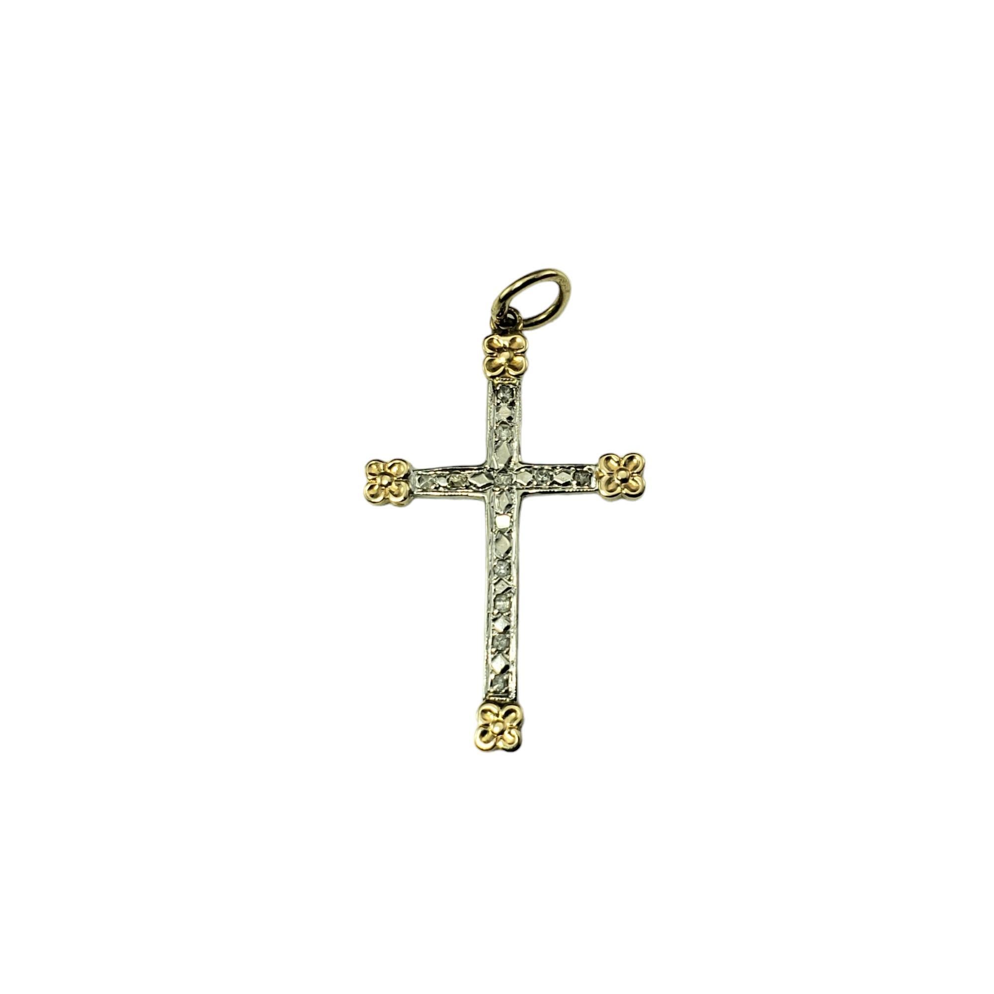 Vintage 14K White and Yellow Gold Diamond Cross Pendant-

This sparkling cross pendant features 12 round table cut diamonds set in classic 14K white and yellow gold.

Total diamond weight: .05 ct.

Diamond color: H

Diamond clarity: I1

Size:  30 mm