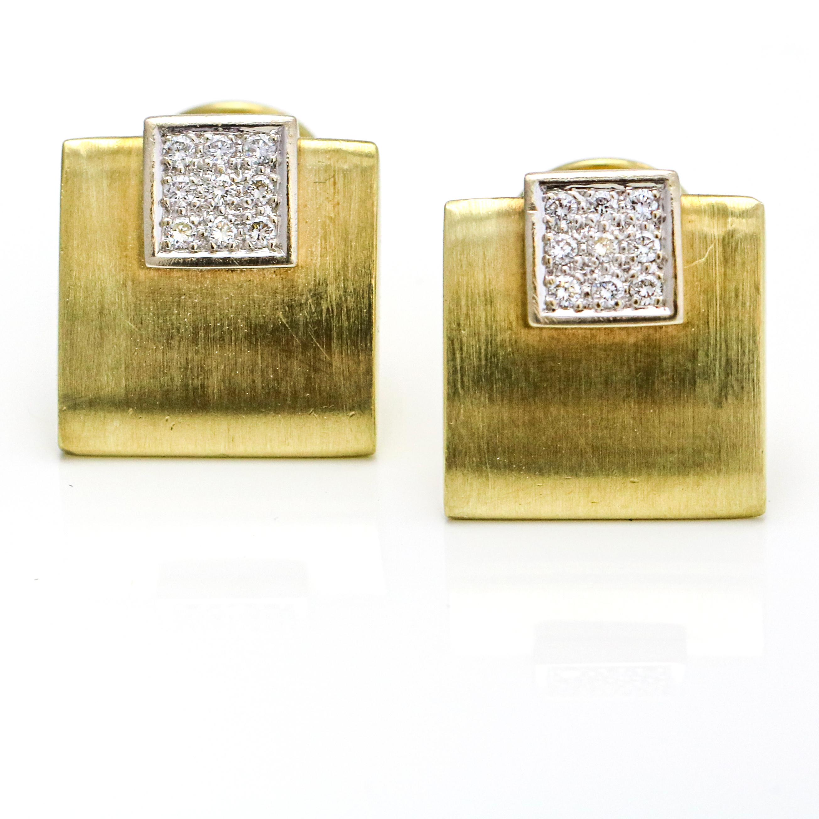 Square cufflinks in 14-karat yellow and white gold with diamonds. Brushed finish metal. Each cufflink has 9 pave set round-cut natural diamonds.

Diamond Total Carat Weight, .40 carat