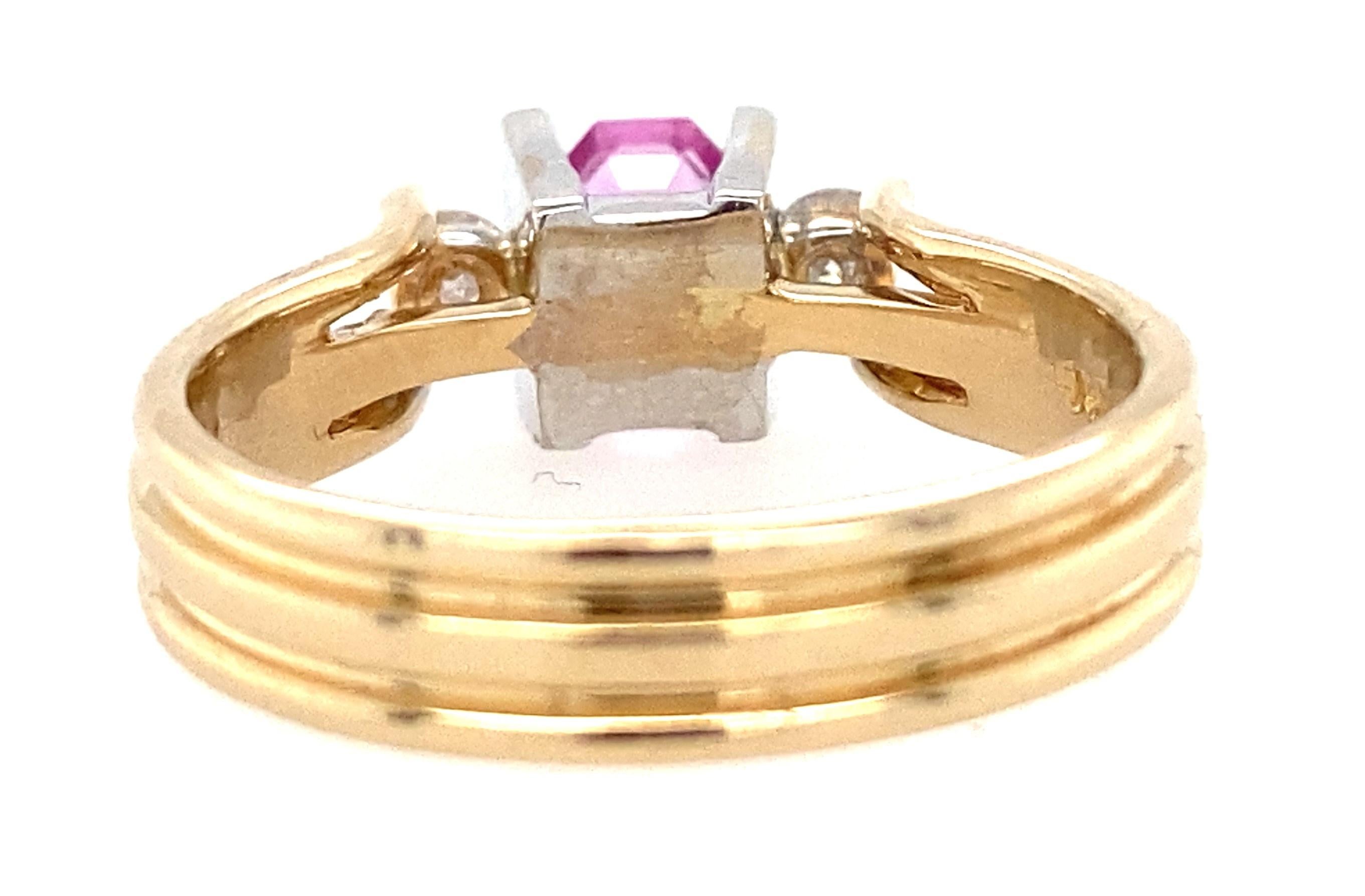 Fresh and architectural, this modern two-tone gold set with a beautiful 0.54ct emerald-cut purplish pink sapphire, accented with 0.16tcw I-J Color, I1-I2 clarity diamonds. It measures 1/4