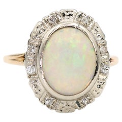 Anello vintage in oro giallo e bianco 14K con diamante naturale e opale naturale