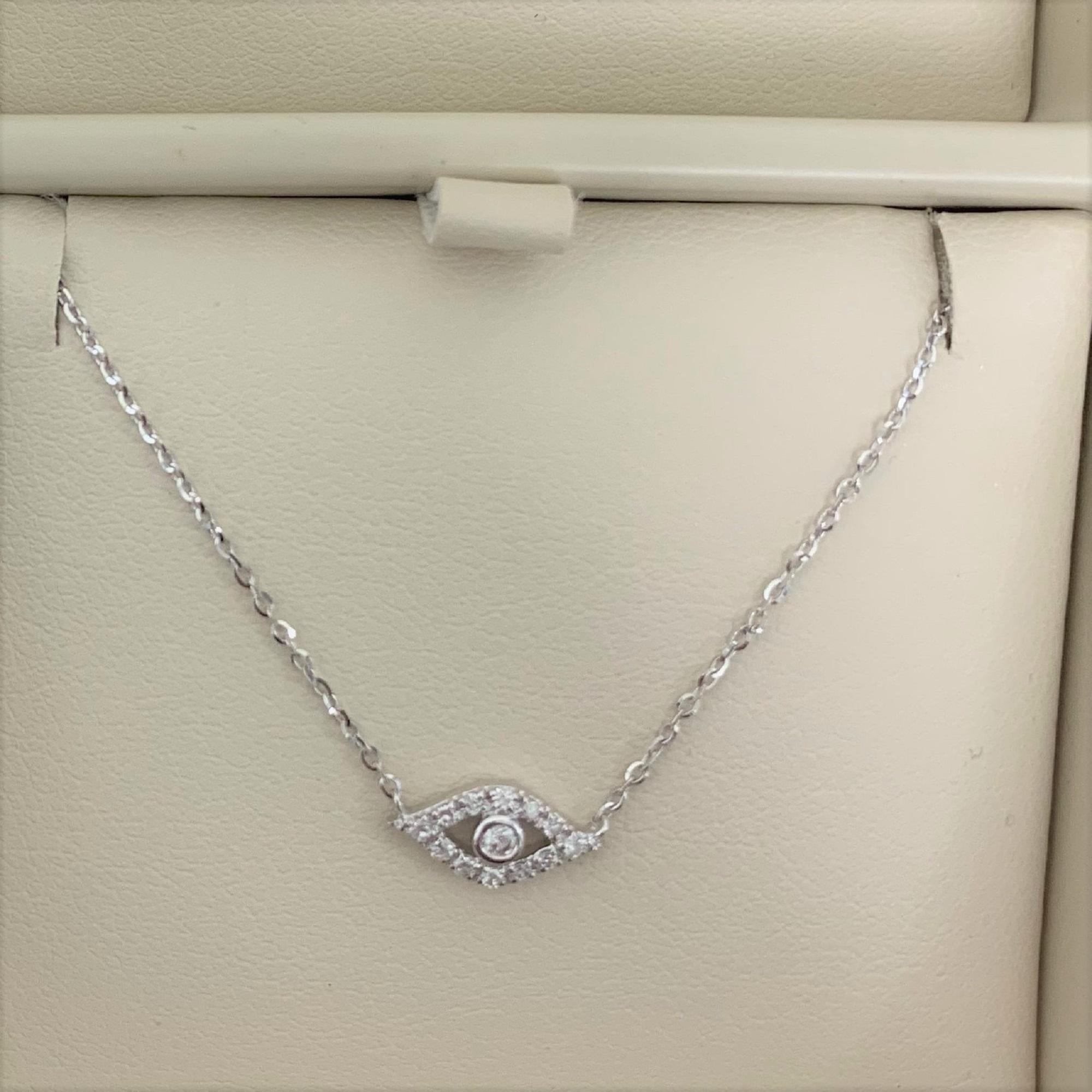 Contemporary 14 Karat White Gold 0.08 Carat Diamond Evil Eye Necklace For Sale