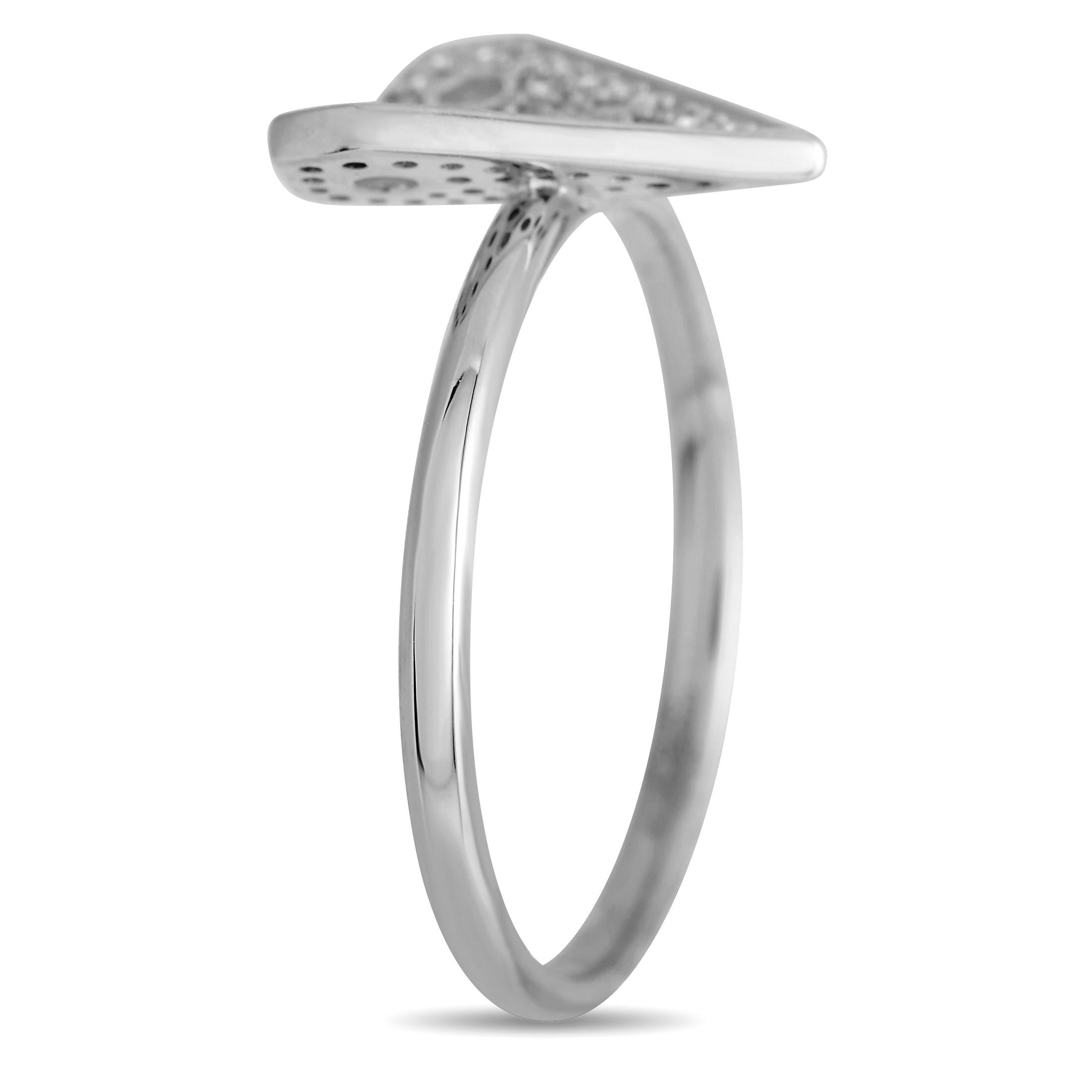Striking a delicate balance between minimalism and sophistication, this geometric ring boasts a tidy and chic aesthetic that works with any outfit or style. The ring has a 1mm slim band topped with a sculpted two-faced heart. One part of the heart