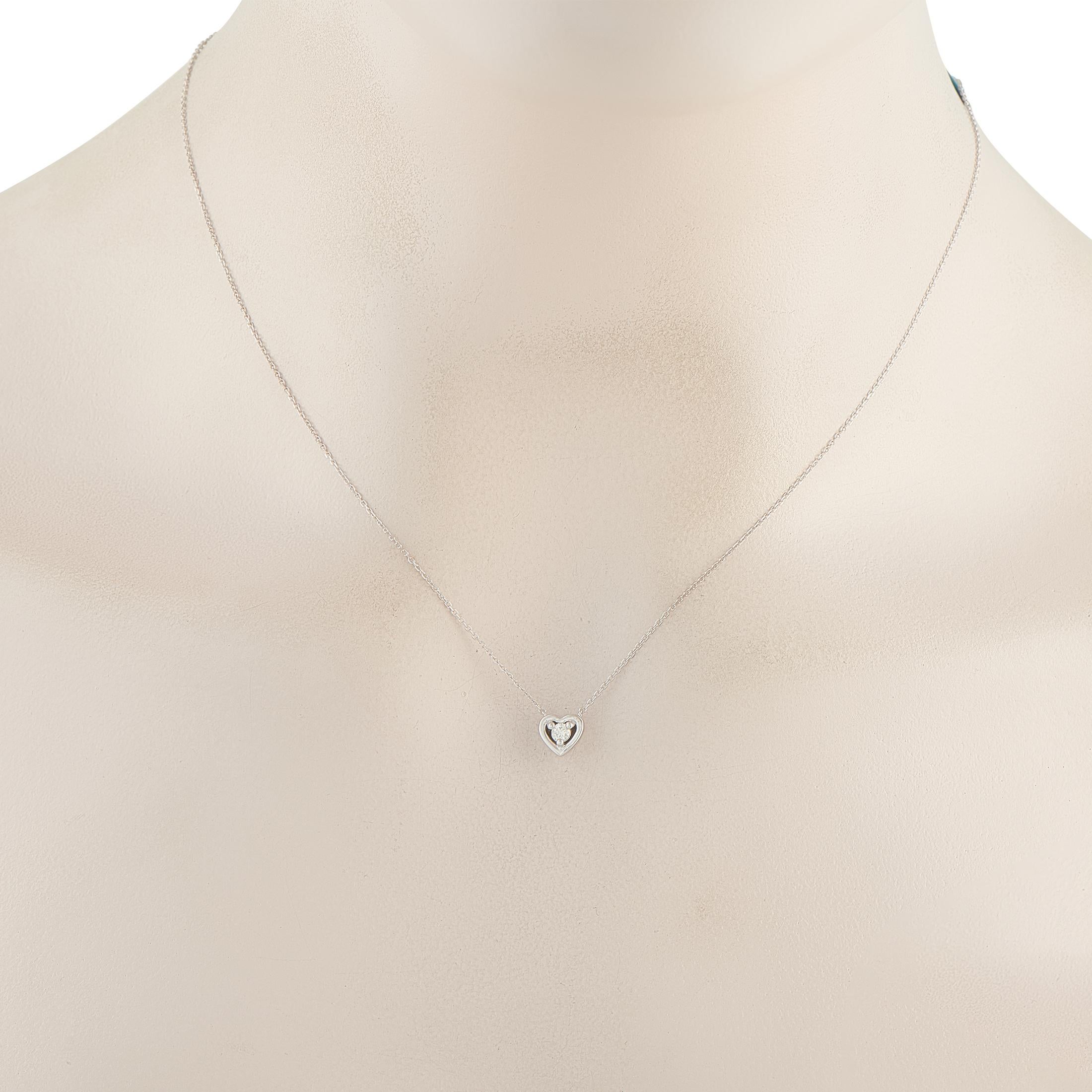 A single 0.10 carat Diamond makes a statement at the center of this necklaces elegant, understated heart-shaped pendant. Crafted from 14K White Gold, the pendant measures 0.25 round and is suspended from an 18 chain. Wear it alone to add a touch of