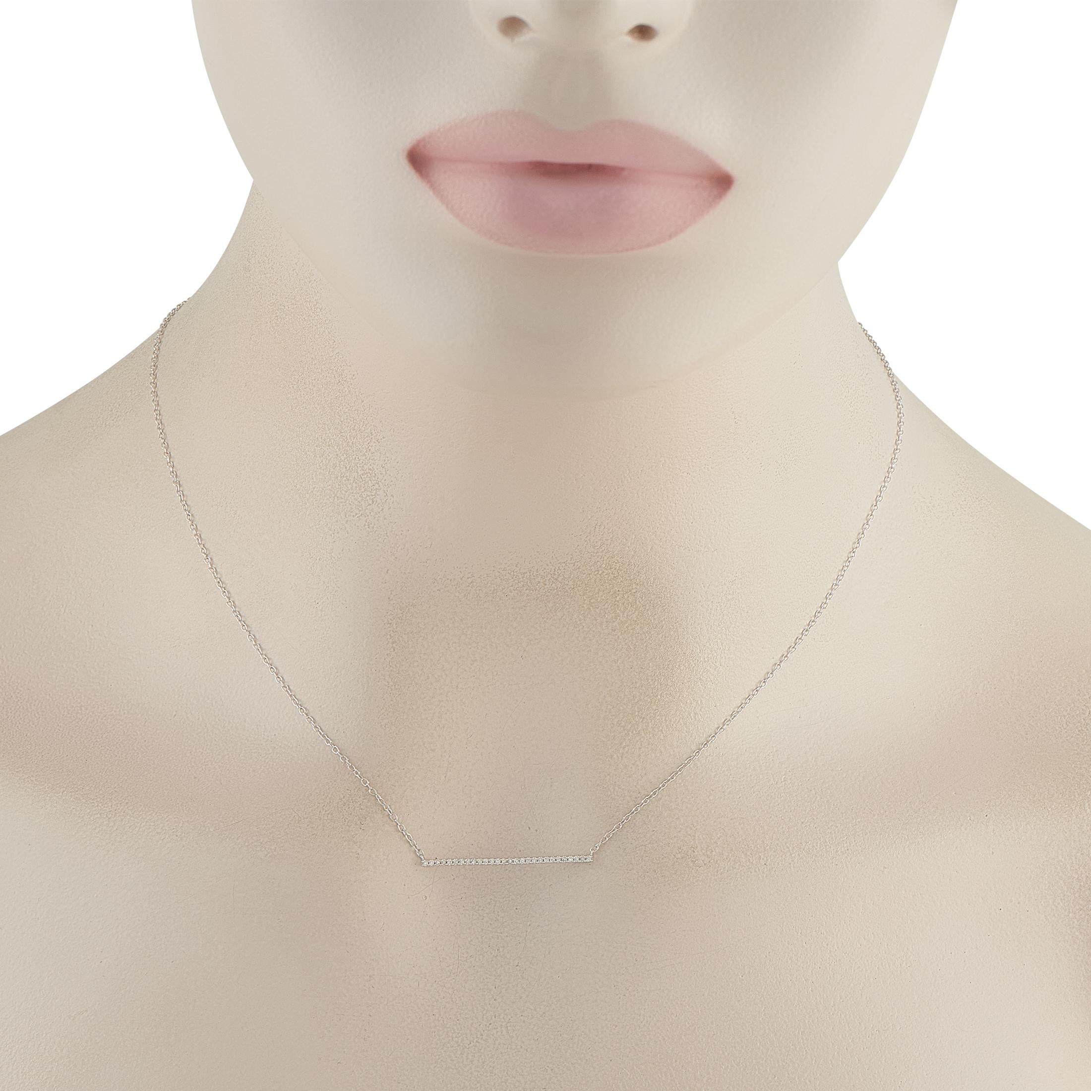 This sleek, sophisticated necklace is the perfect way to add a touch of luxury to any outfit or occasion. The understated design features a series of Diamonds totaling 0.10 carats accenting a slender pendant measuring 0.05 long by 1.05 wide. Its