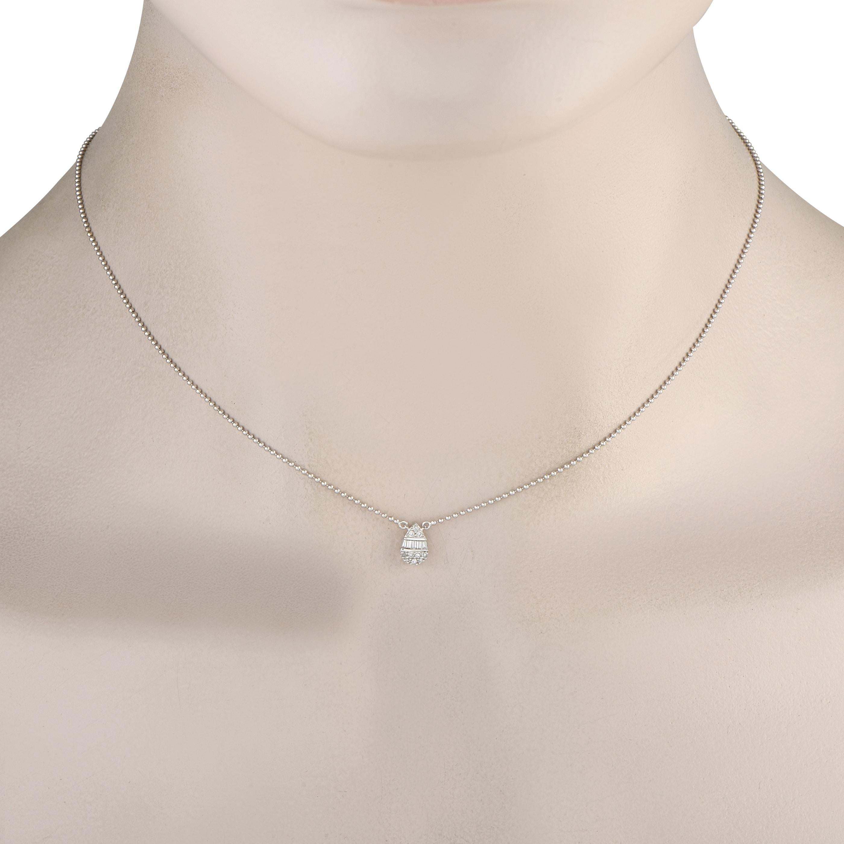 You'll find yourself reaching for this necklace daily. Crafted for comfort and versatility, it features a fine and lightweight ball chain holding a pear-shaped cluster pendant of round and baguette diamonds. Its understated sparkle is simply perfect