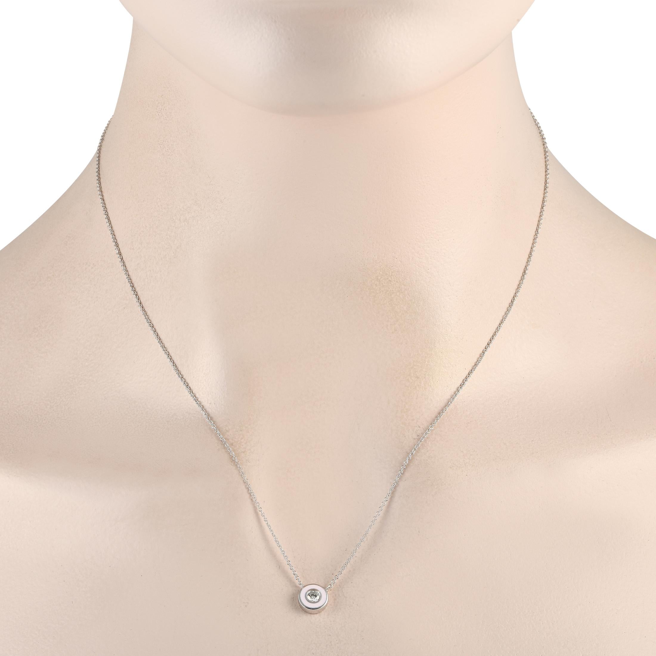 The perfect finishing touch to every outfit. Dot your daily looks with just the right touch of sparkle from this minimalist necklace. It features an 18-long chain in 14K white gold. It has a disc pendant with a bezel-set round diamond at the