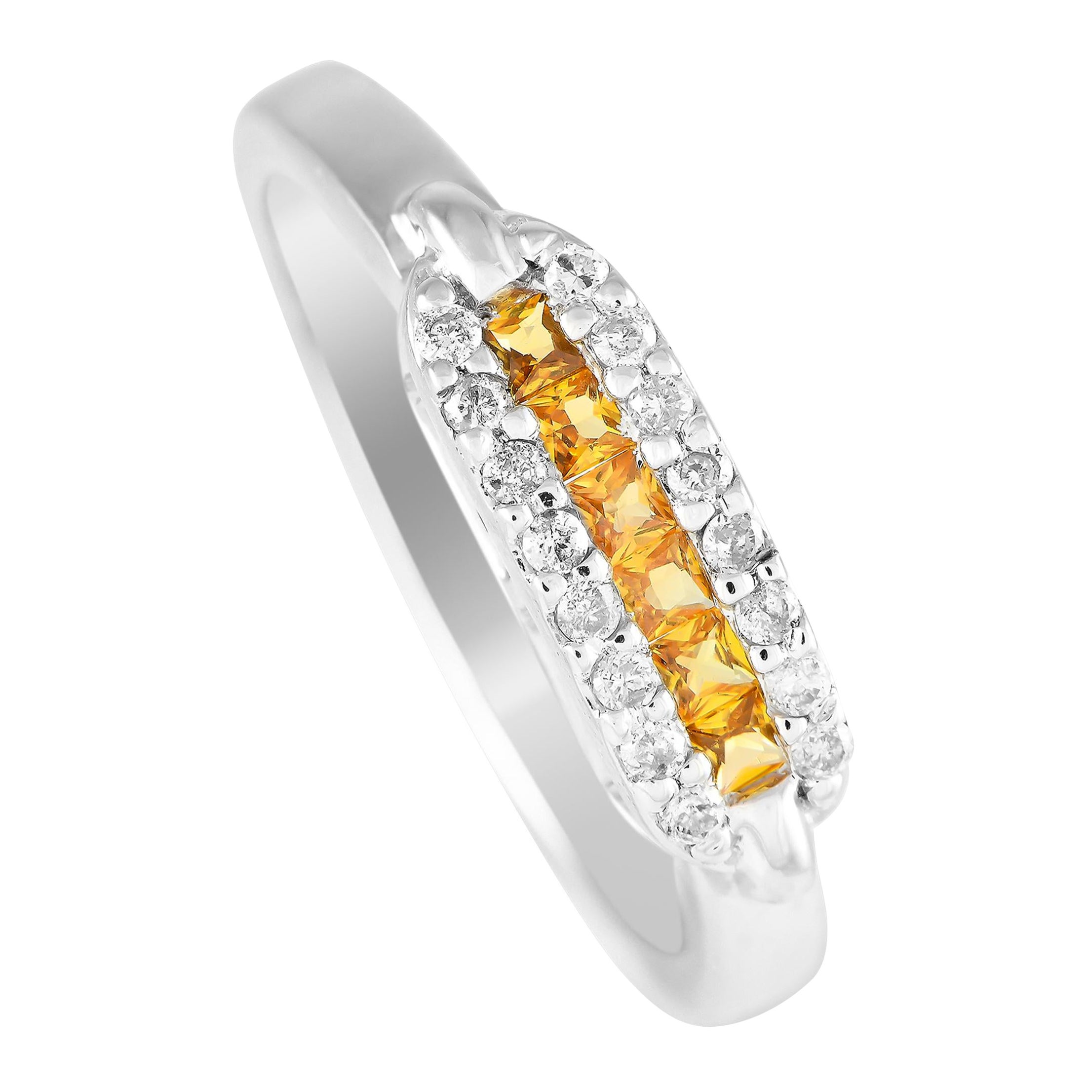 Anillo de oro blanco de 14 quilates con diamantes y zafiros de 0,15 ct MF04-120424 en venta