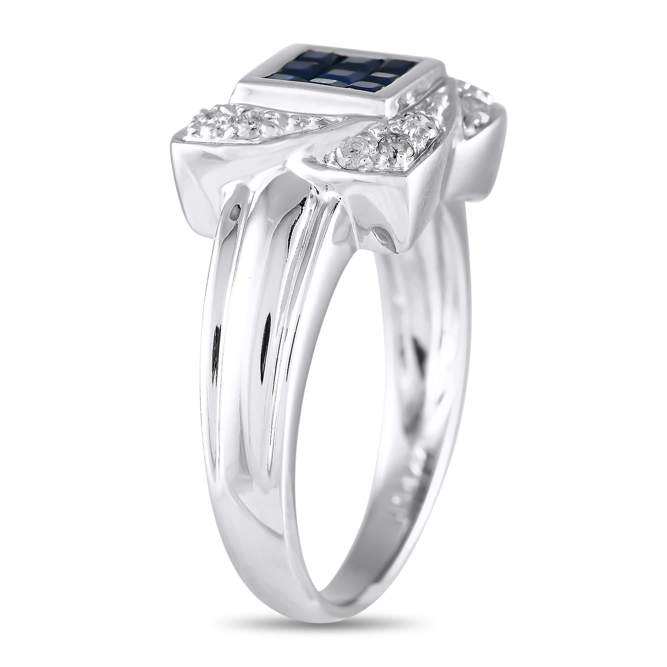 Ideal for everyday wear, this delicate 14K White Gold ring is undeniably charming. An arrangement of deep blue Sapphire gemstones with a total weight of 0.42 carats make a statement at the center. A unique halo of Diamonds totaling 0.15 carats adds