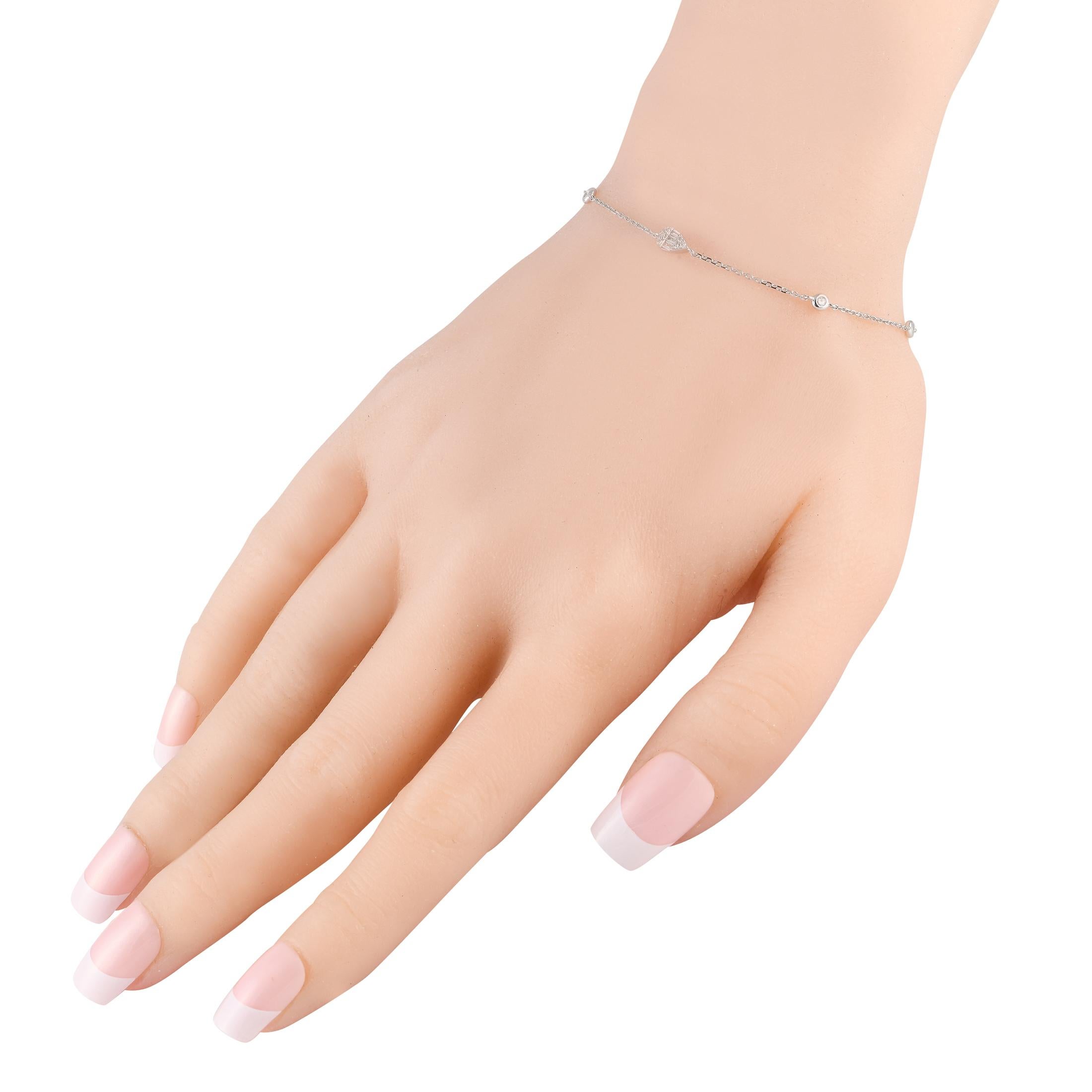 Just like your go-to basic white tee, this minimalist diamond bracelet is that easy, classic accessory you can wear anywhere. The white gold chain bracelet measures 7 inches long and has a lobster clasp. It shimmers with 0.15 carats of diamonds, set