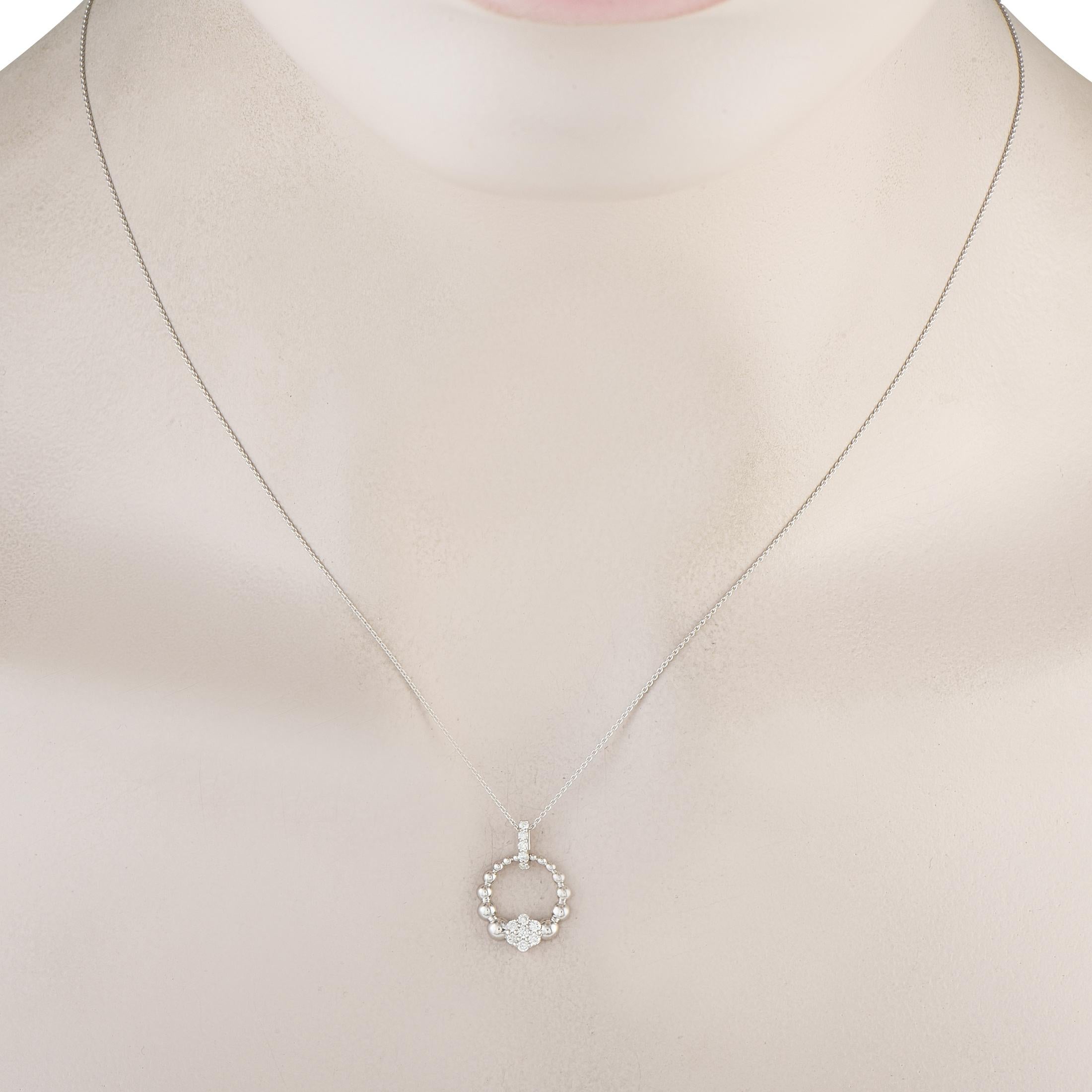 Lightweight and endlessly wearable, this necklace has the subtle sparkle that can instantly update your daily outfits. It features a dainty white gold chain with a barely-there presence. Hanging from it is a diamond-studded bail holding a beaded