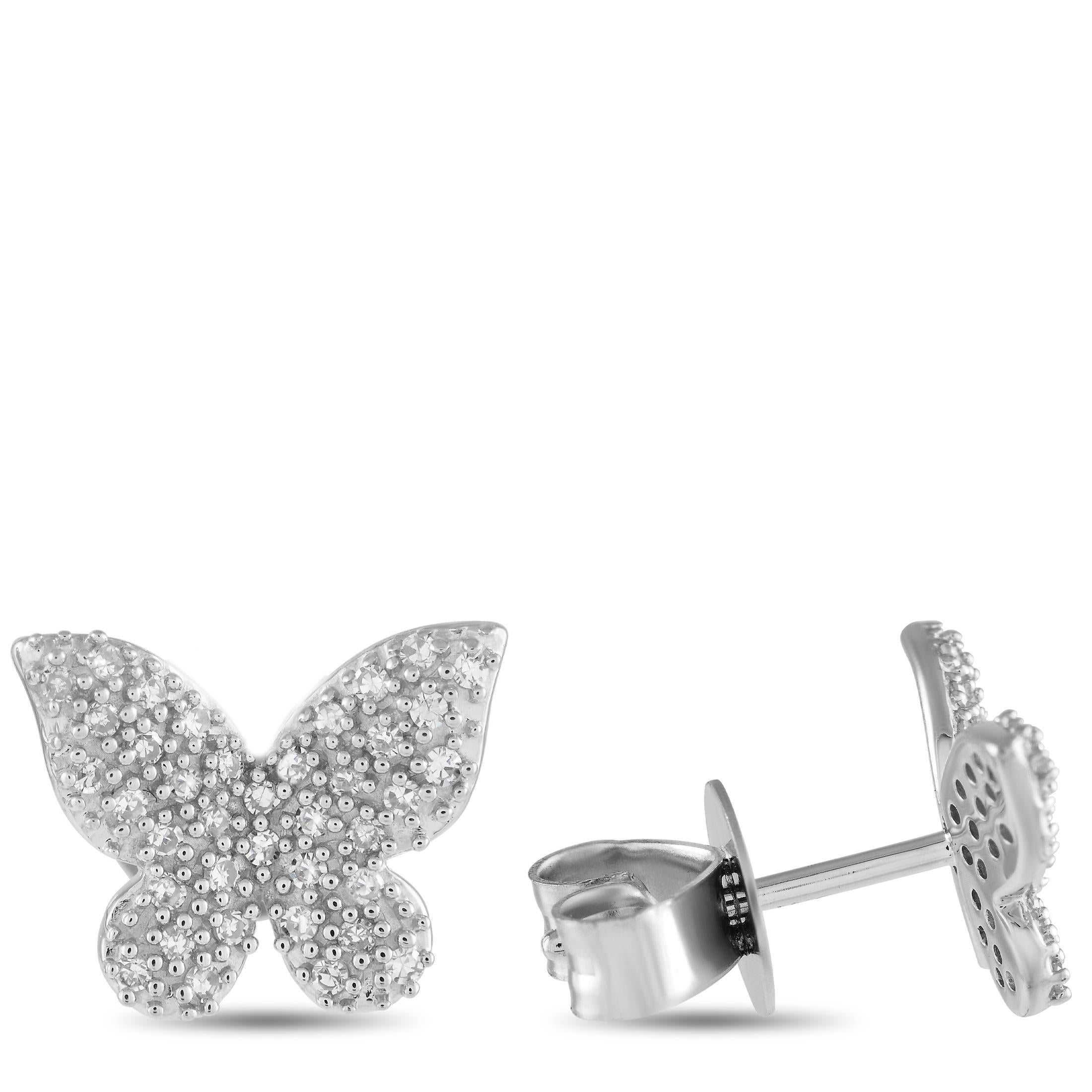 These charming butterfly earrings will instantly captivate. Each one features a textured 14K white gold butterfly shaped setting that measures 0.45 round. Diamonds with a total weight of 0.16 carats make them perfect for adding a touch of luxury to