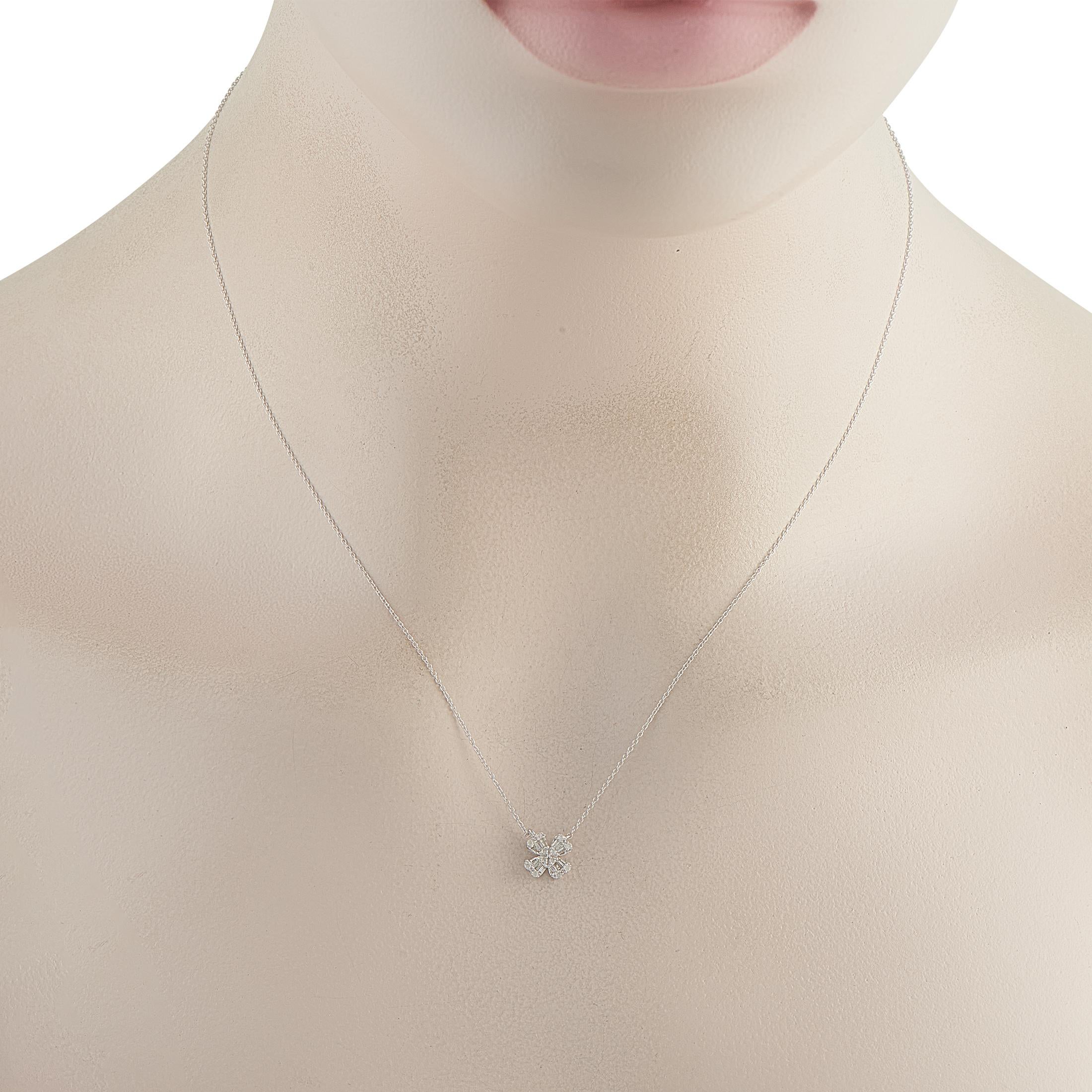 A clover-shaped pendant makes this 14K White Gold necklace a charming addition to any ensemble. Accented by Diamonds totaling 0.20 carats, the pendant measures 0.32 round and is suspended from an 18 chain.This jewelry piece is offered in brand new