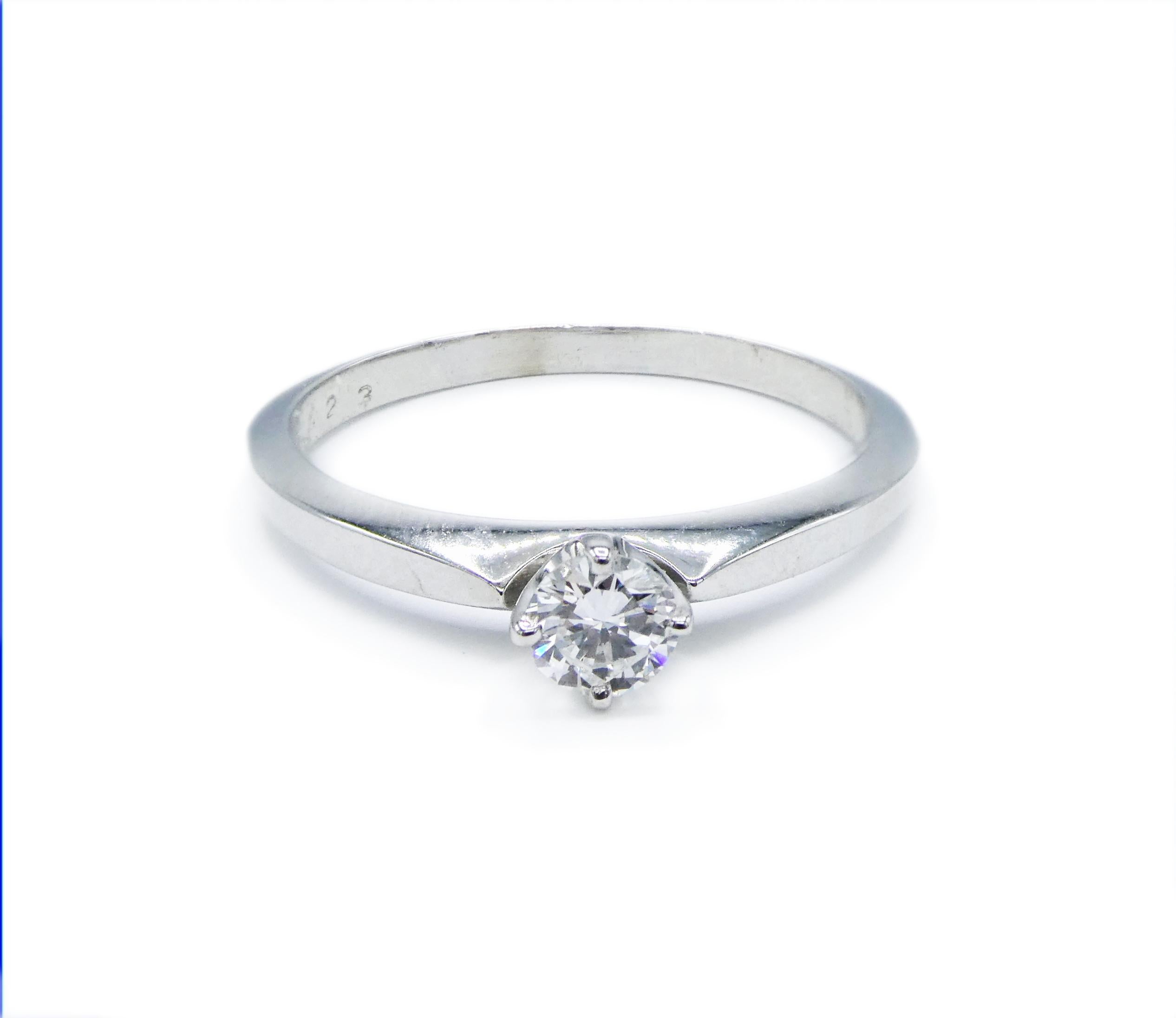 14K White Gold 0.23 Carat Round Diamond Solitaire Engagement Ring Size 5.75 

Metal: 14K White Gold
Weight: 1.71 grams
Diamond:  0.23ct Round Brilliant Cut Diamond Approx. G SI
Ring size: 5.75 (5 3/4)
Band is 1.7mm wide 
Recently polished

If you