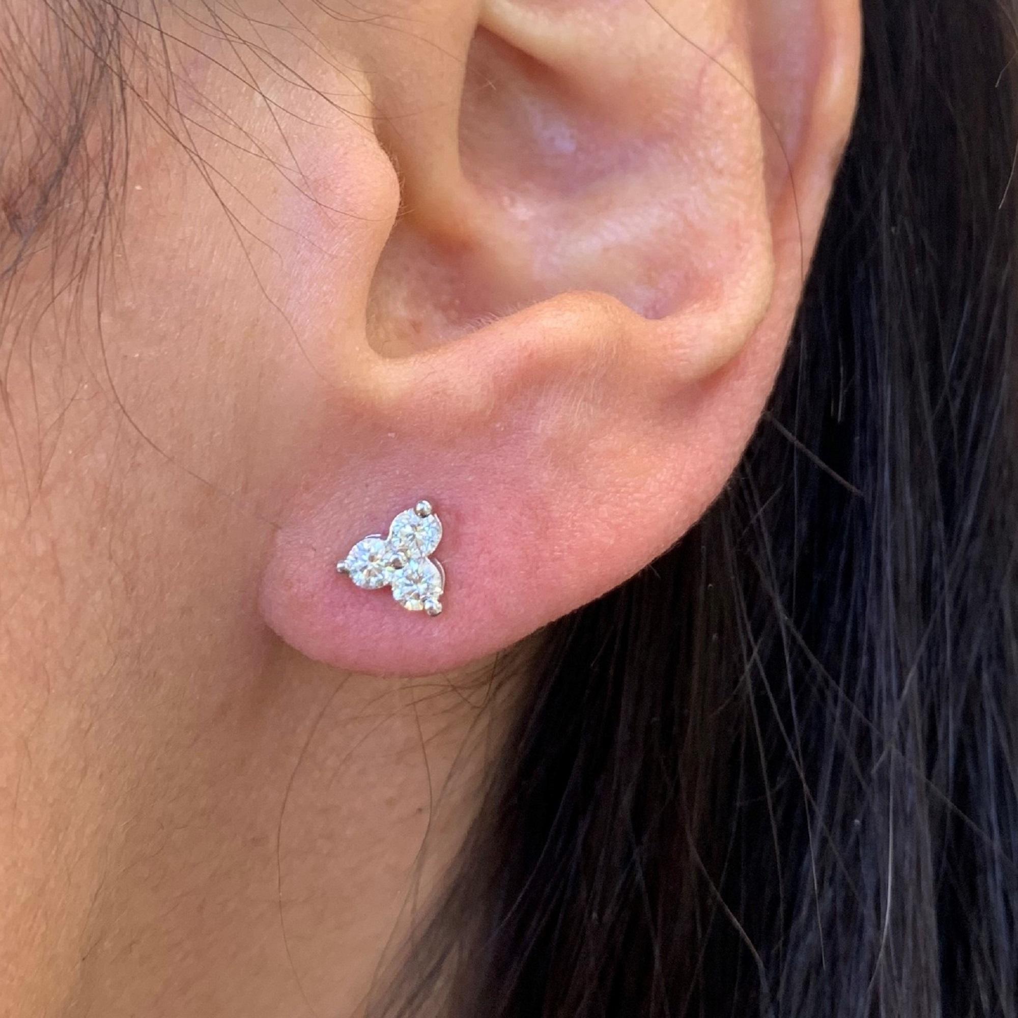 These Beautiful and Classic 3-Stone Diamond Cluster Stud Earrings are crafted of 14K White Gold and feature 6 white round Diamonds weighing 0.24cts, has butterfly push-backs for closure. Diamond Color & Clarity is GH-SI1
-14K White Gold
-0.24cts