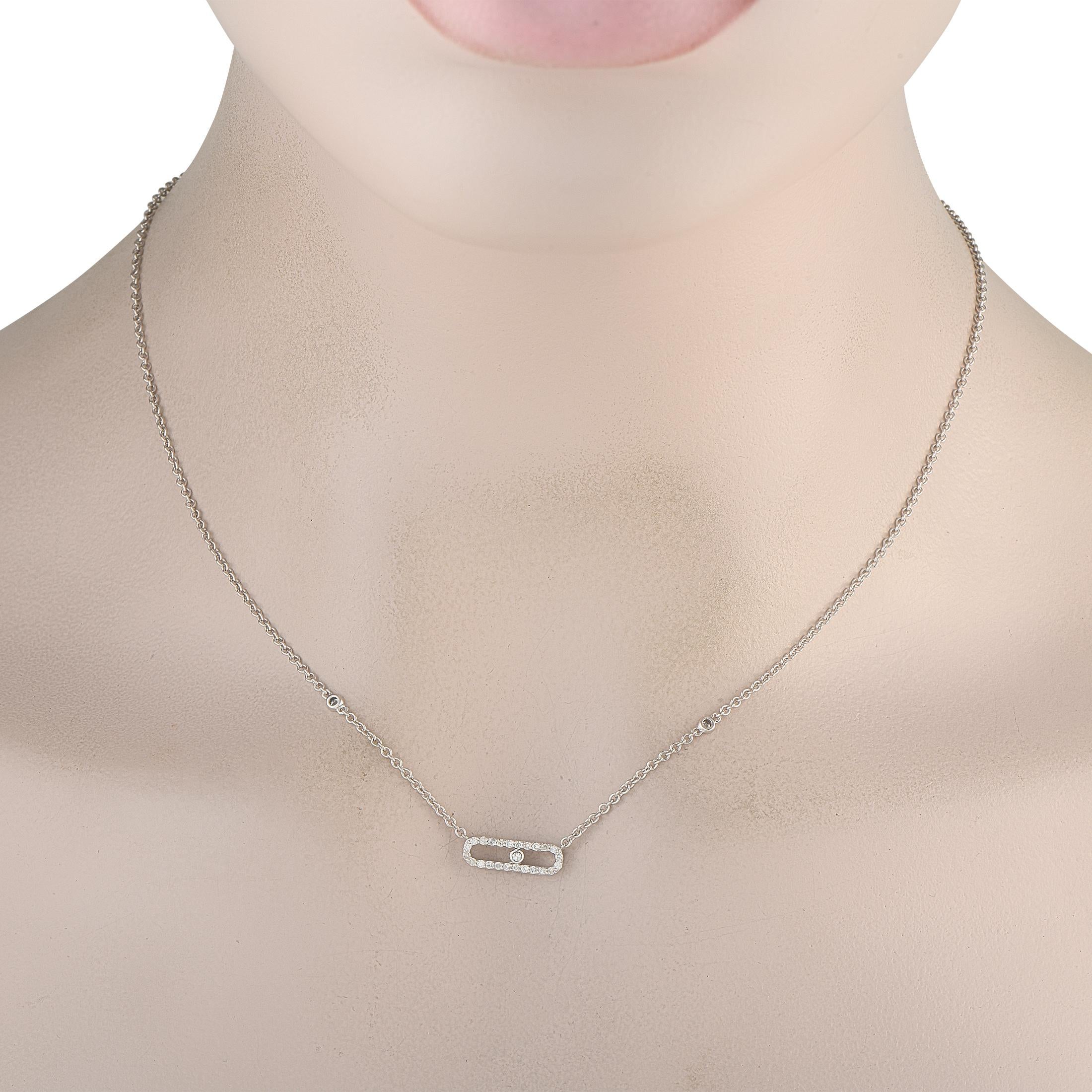 This necklace will effortlessly elevate any ensemble. At the center of the delicate 17 chain, an oval-shaped pendant measures 0.15 long by 0.55 wide and includes a single bezel-set Diamond at the center of the design. The entire pendant showcases