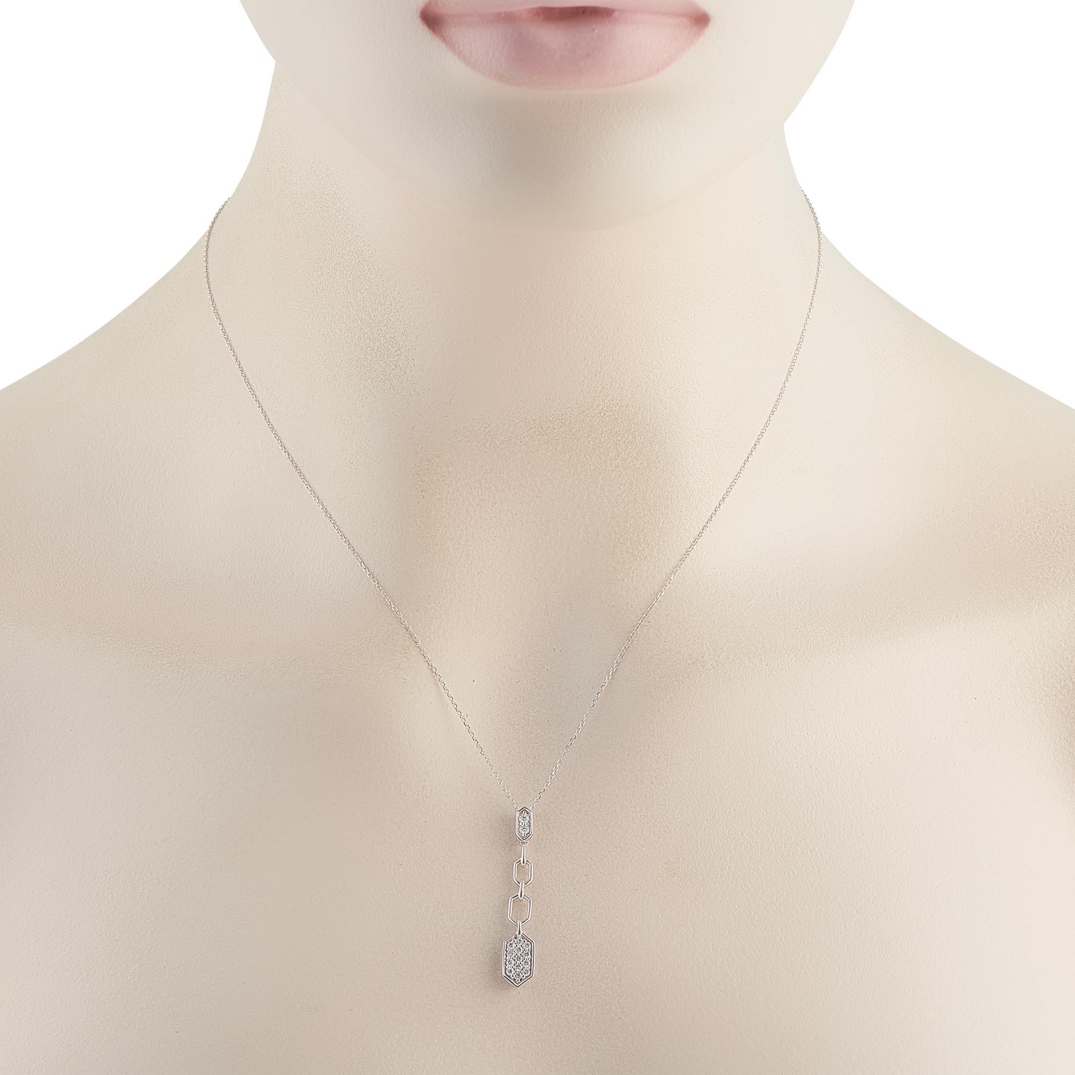 This luxury necklace is sleek, stylish, and incredibly sophisticated. Sparkling Diamonds totaling 0.25 carats elevate the stunning geometric pendant. Crafted from 14K White Gold, the pendant measures 1.38 long by 0.25 wide and is suspended from a 20