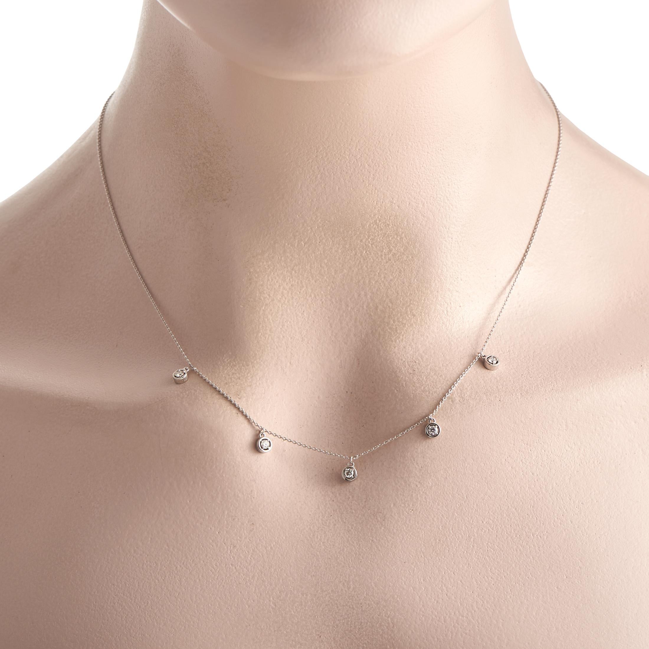 This diamond station necklace can give an instant lift to any outfit. Its minimalist profile and understated sparkle make it suitable for casual, work, evening, or formal wear. The necklace is designed with a 17-long chain and a secure lobster