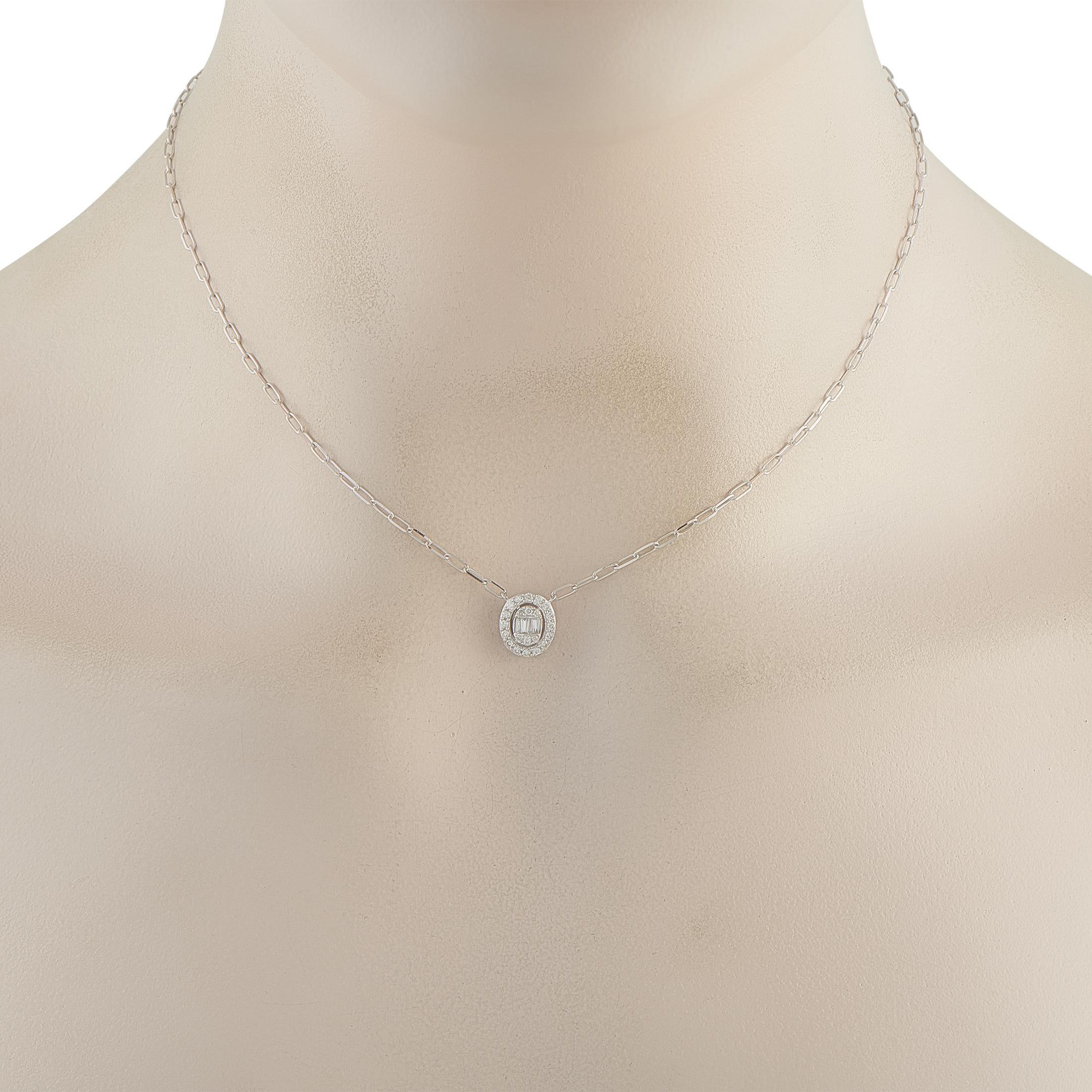 This stylish necklace will complement any ensemble. Crafted from 14K White Gold, the oval-shaped pendant shines to life thanks to inset Diamonds totaling 0.30 carats. The pendant measures 0.44 long by 0.38 wide and is suspended at the center of a
