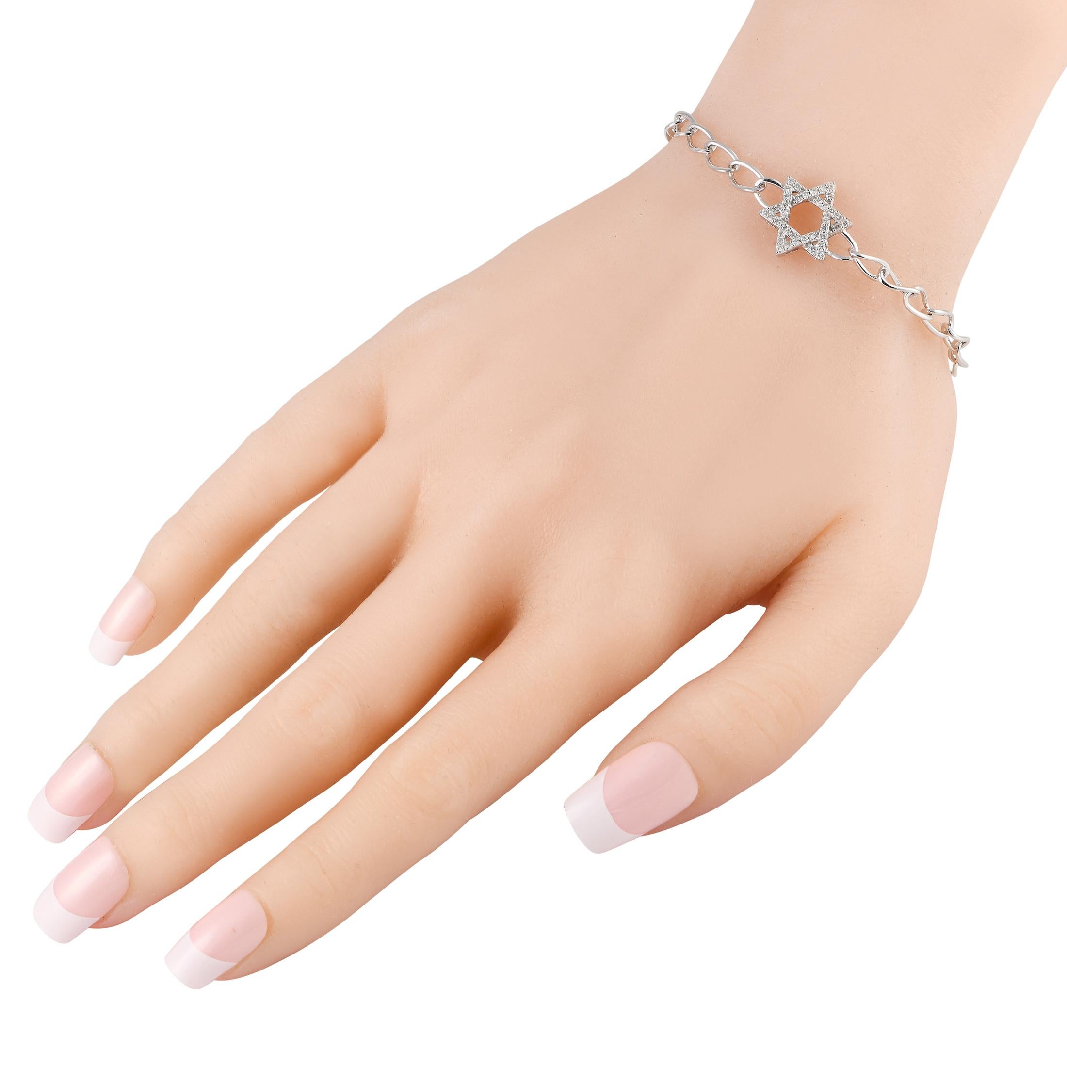 A six-pointed star makes a statement at the center of this simple, elegant bracelet. Crafted from 14K white gold, the star shaped pendant is elevated by sparkling inset diamonds totaling 0.30 carats. It measures 7.0 long and comes complete with